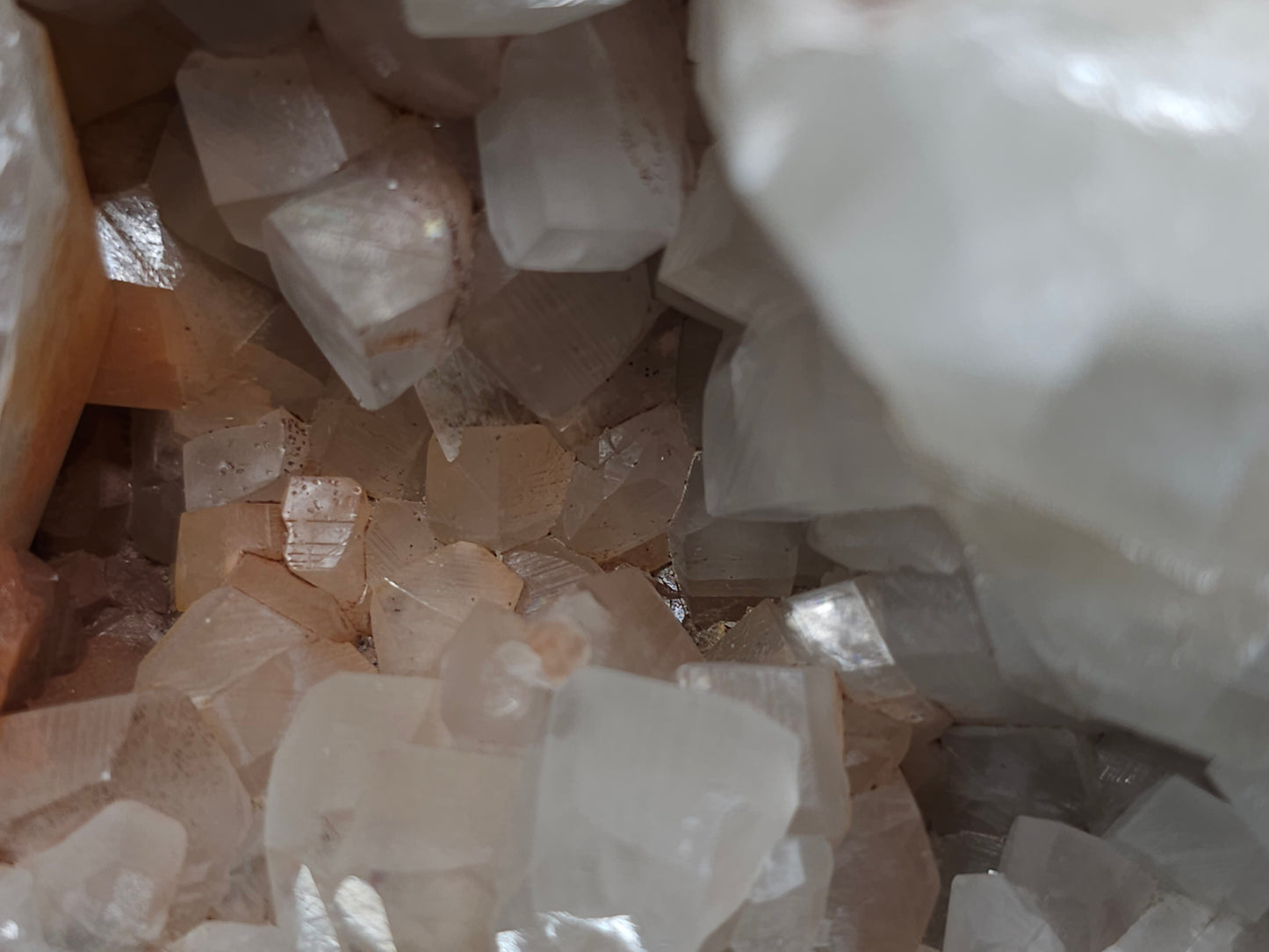 #11072 White and clear Combined form Calcite with Hematite inclusions on matrix