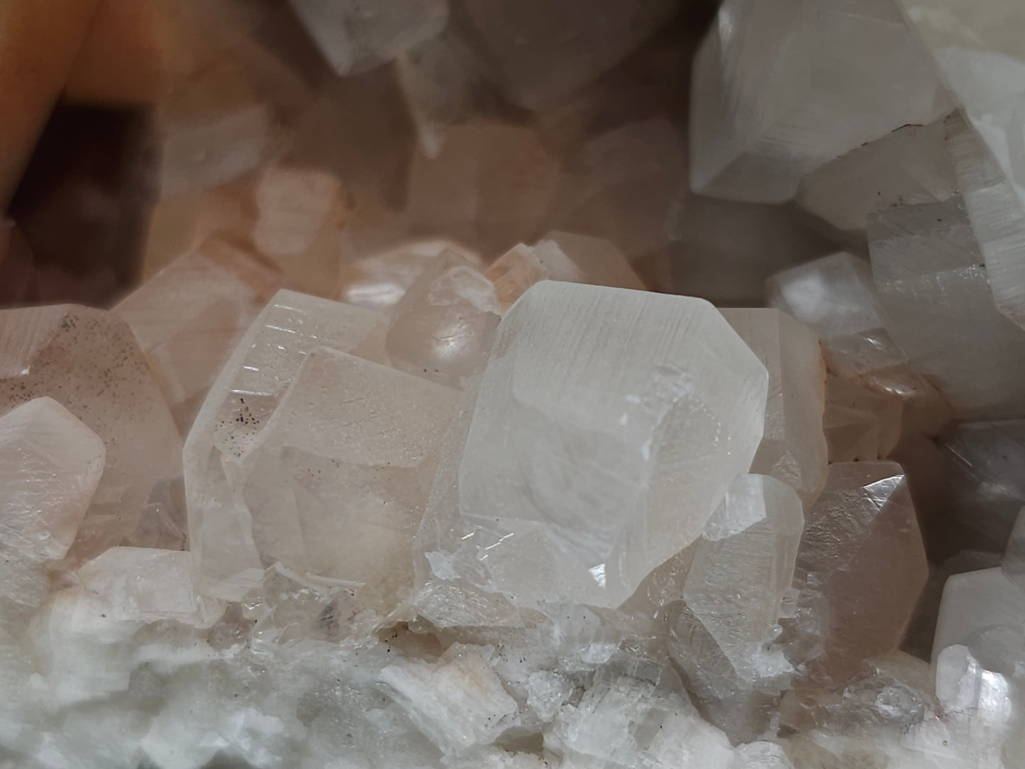#11072 White and clear Combined form Calcite with Hematite inclusions on matrix