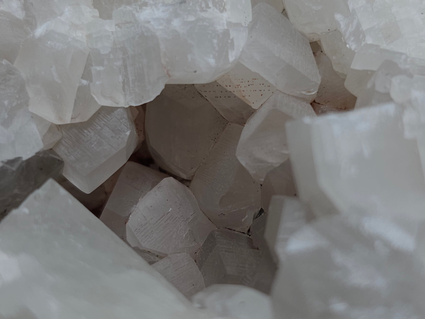 #11072 White and clear Combined form Calcite with Hematite inclusions on matrix