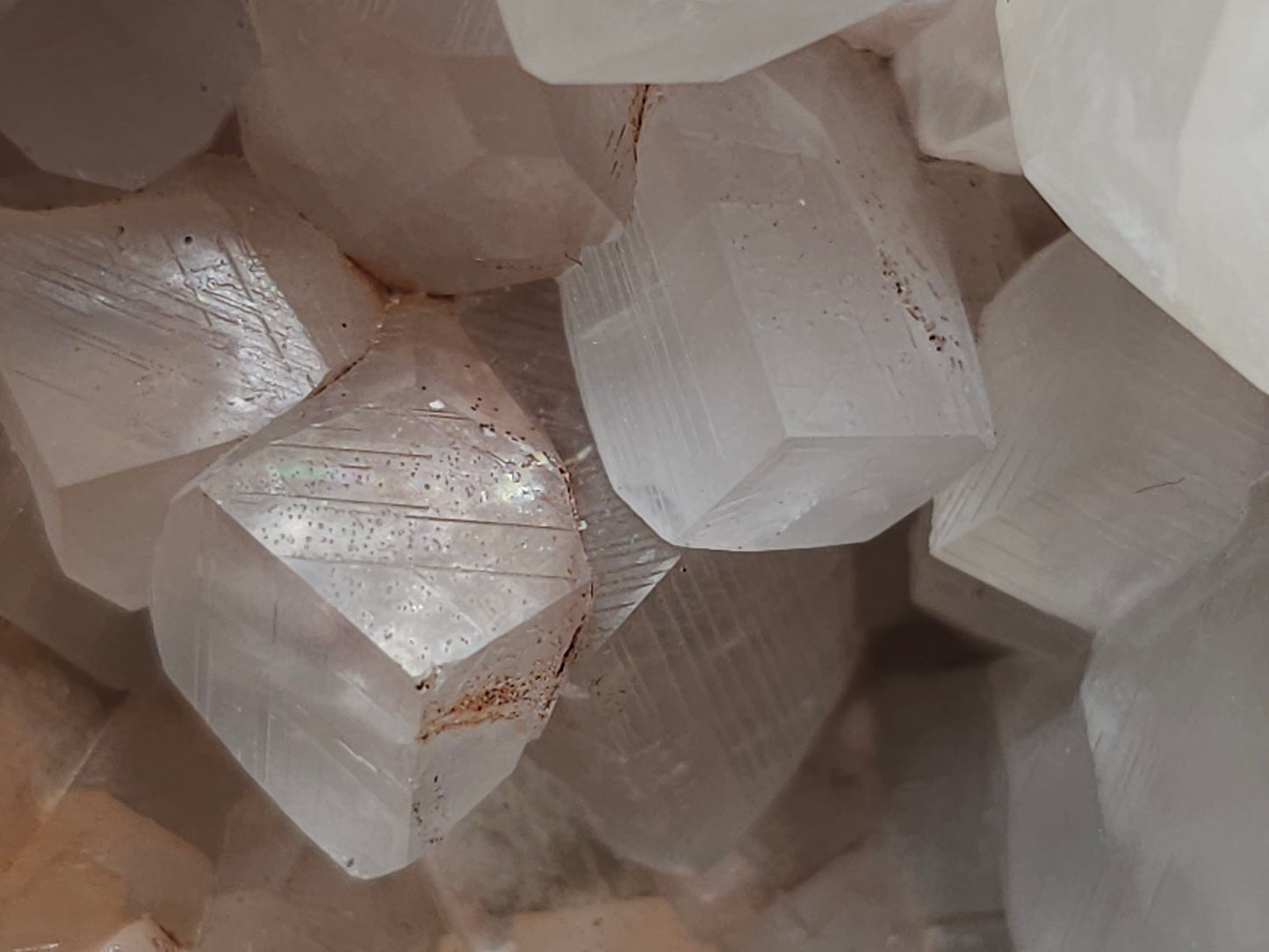 #11072 White and clear Combined form Calcite with Hematite inclusions on matrix