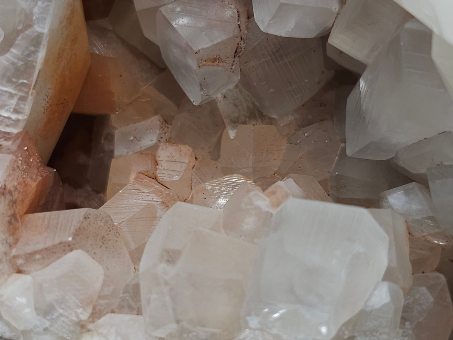 #11072 White and clear Combined form Calcite with Hematite inclusions on matrix