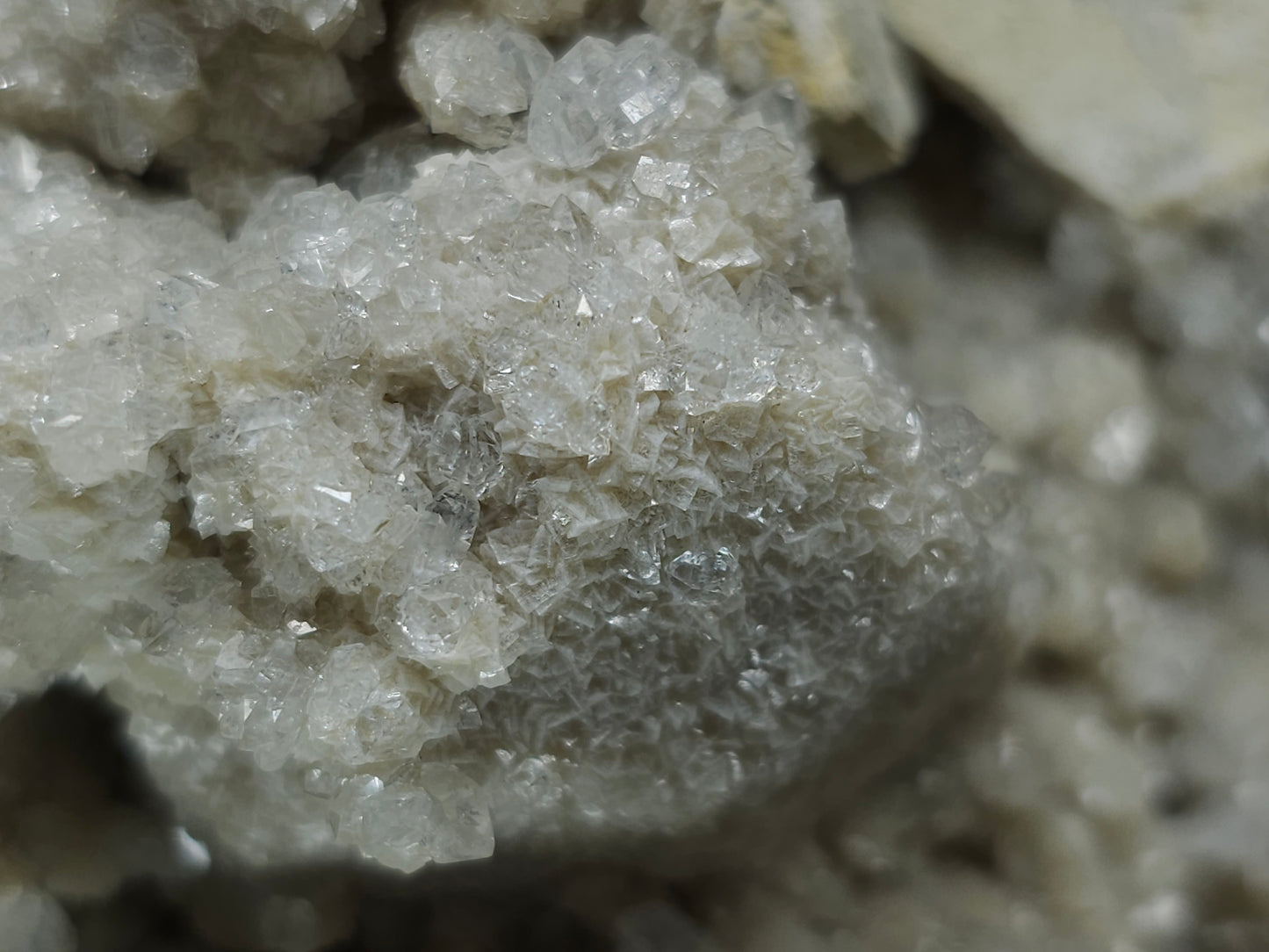 #88178 Spirit Quartz on cream-white Calcite pseudomorph after Combined form, Calcite pseudomorph after iron Dolomite coating on Combined form Calcite on matrix