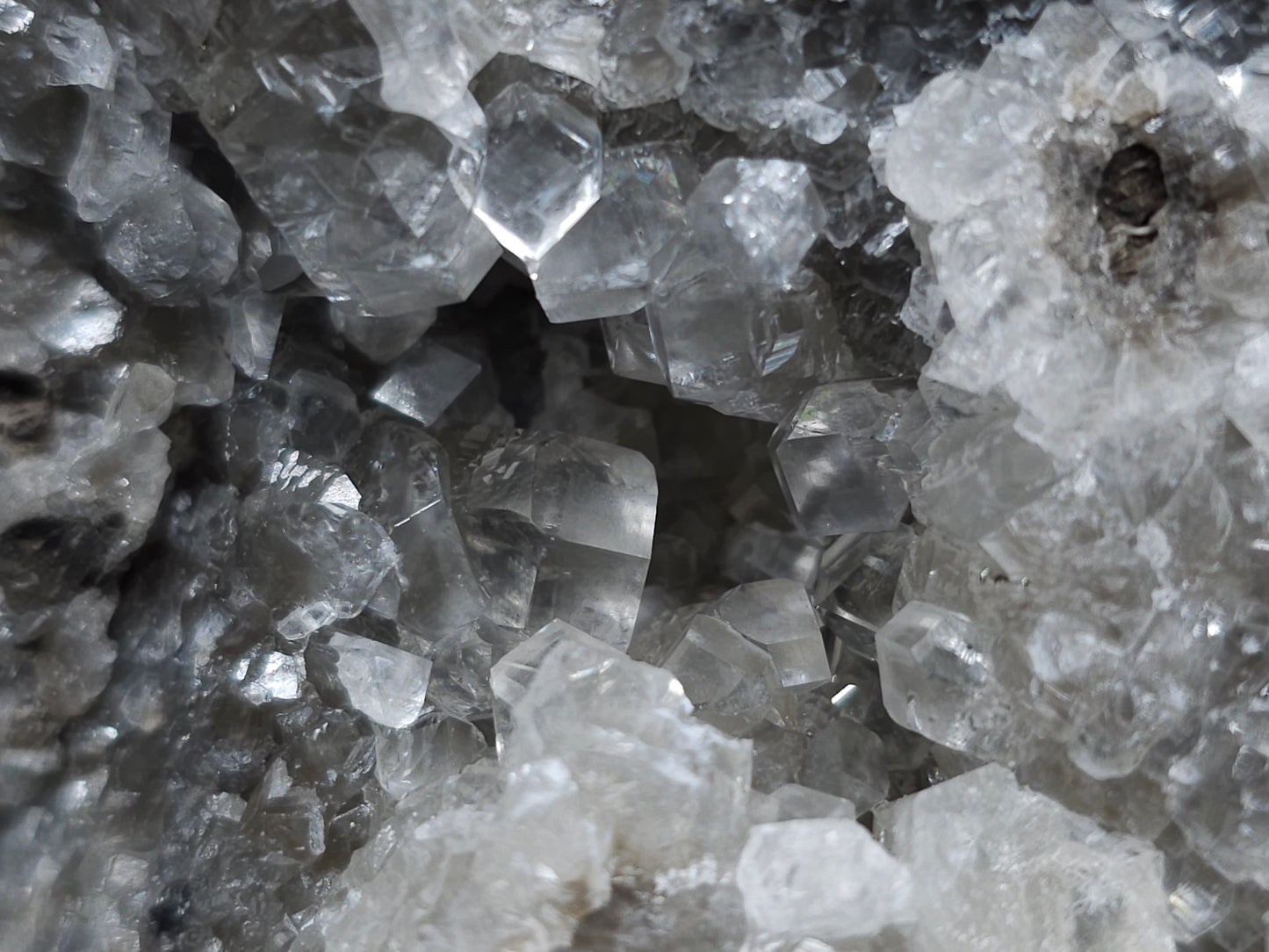 #33129 Super clear Nailhead Spar Calcite geode with Chalcopyrite ore and multiple small fossils in the matrix