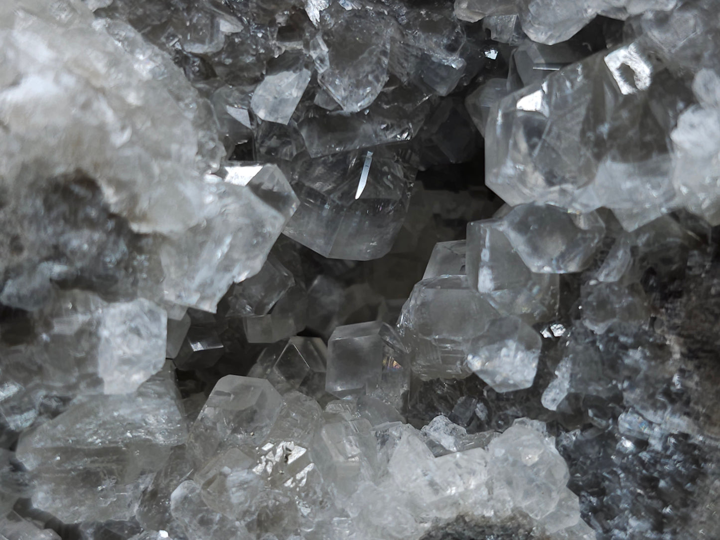 #33129 Super clear Nailhead Spar Calcite geode with Chalcopyrite ore and multiple small fossils in the matrix