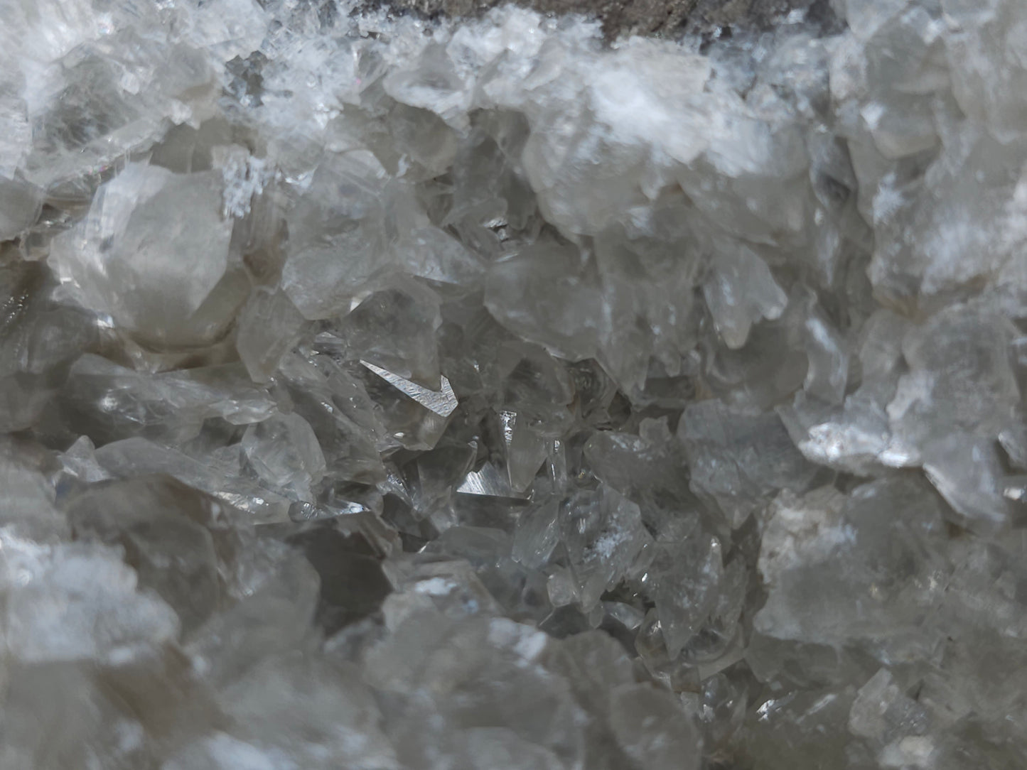 #33129 Super clear Nailhead Spar Calcite geode with Chalcopyrite ore and multiple small fossils in the matrix