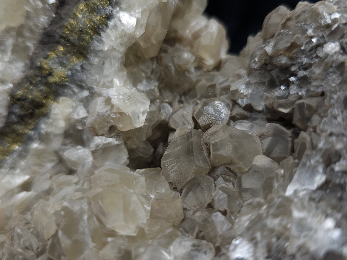 #33127 Super clear Nailhead Spar Calcite geode with Chalcopyrite ore and multiple small fossils in the matrix