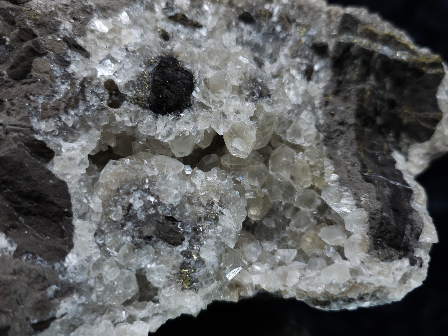 #33130 Super clear Nailhead Spar Calcite geode with Chalcopyrite ore and multiple small fossils in the matrix