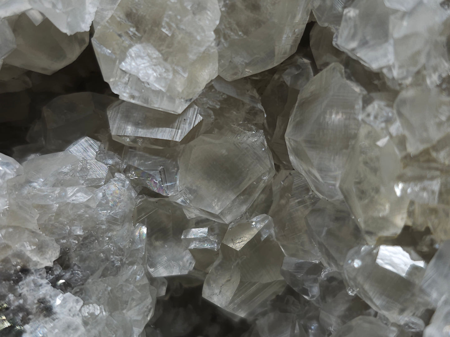 #33130 Super clear Nailhead Spar Calcite geode with Chalcopyrite ore and multiple small fossils in the matrix