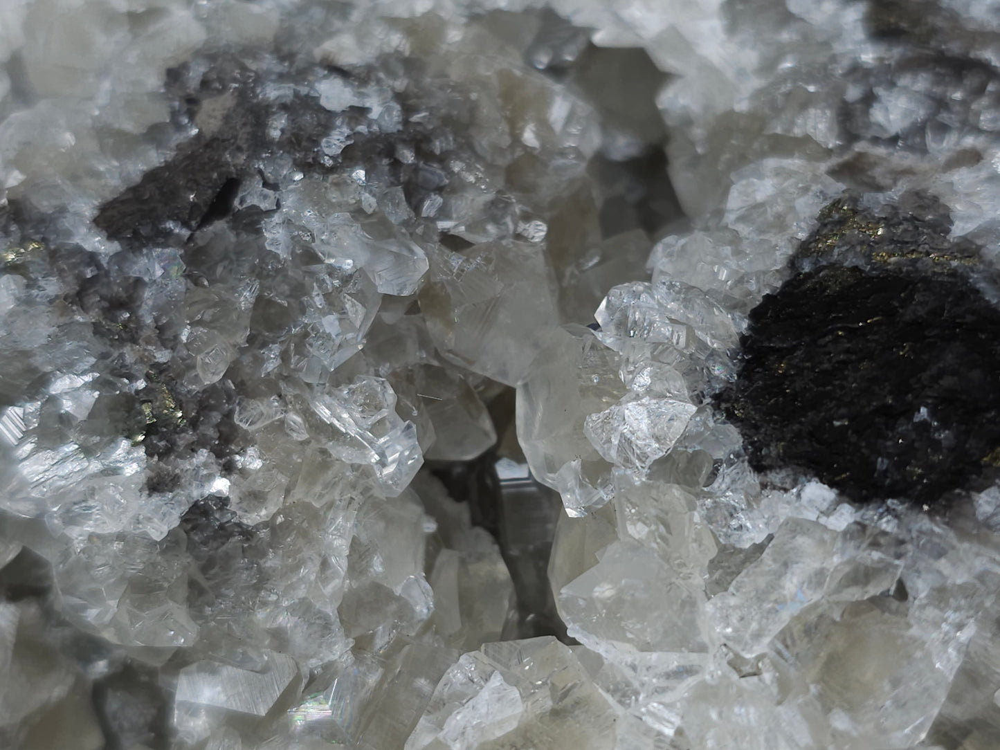 #33130 Super clear Nailhead Spar Calcite geode with Chalcopyrite ore and multiple small fossils in the matrix