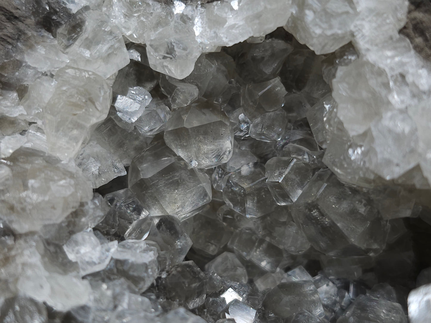 #33131 Super clear Nailhead Spar Calcite geode with Chalcopyrite ore and multiple small fossils in the matrix