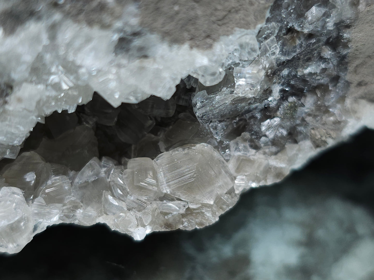 #33131 Super clear Nailhead Spar Calcite geode with Chalcopyrite ore and multiple small fossils in the matrix