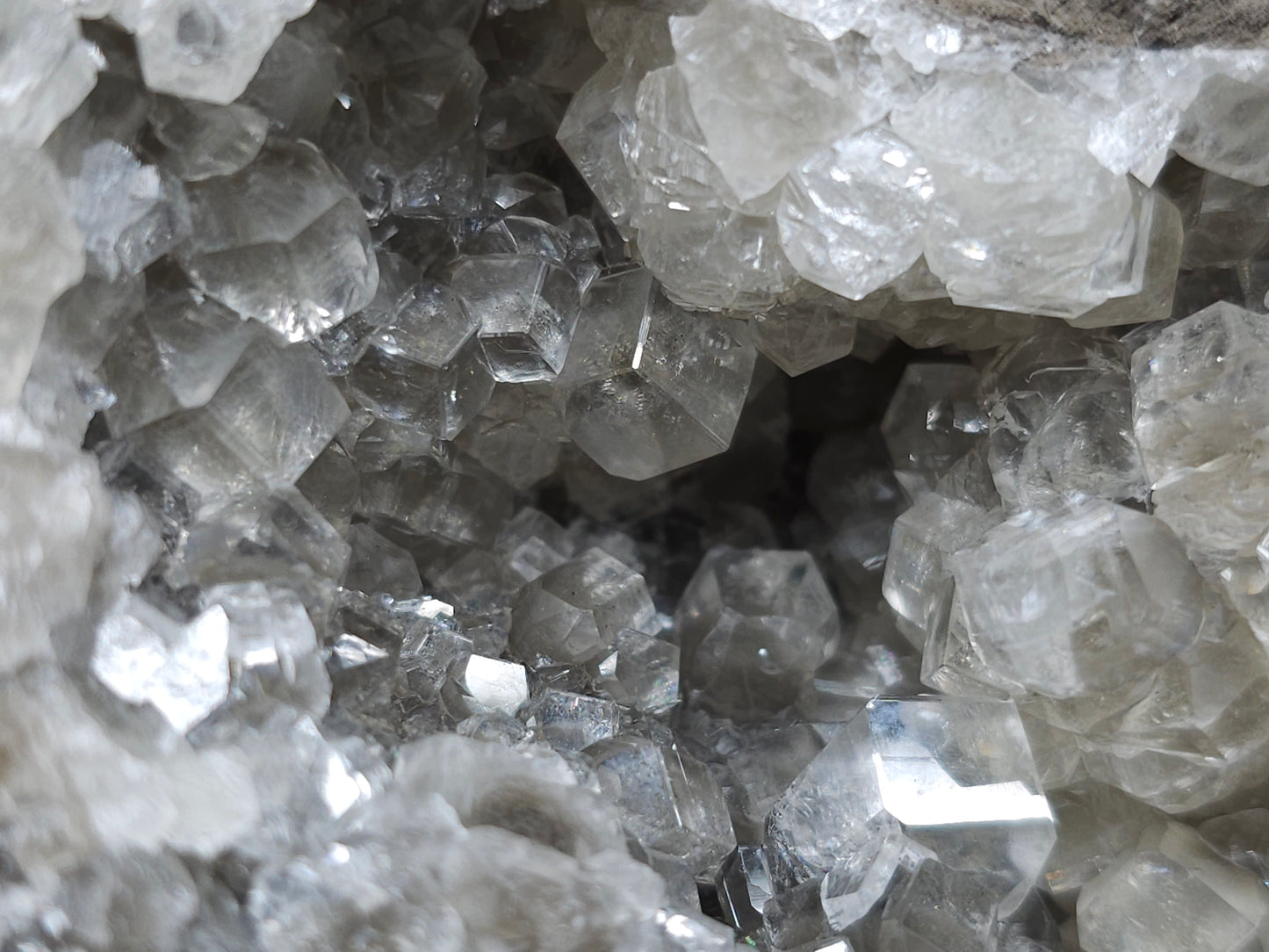 #33131 Super clear Nailhead Spar Calcite geode with Chalcopyrite ore and multiple small fossils in the matrix