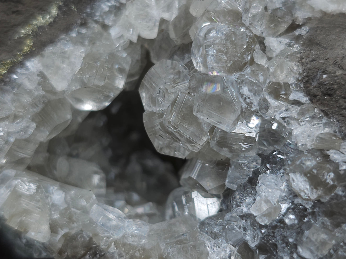 #33146 Super clear Nailhead Spar Calcite geode with Chalcopyrite ore and multiple small fossils in the matrix