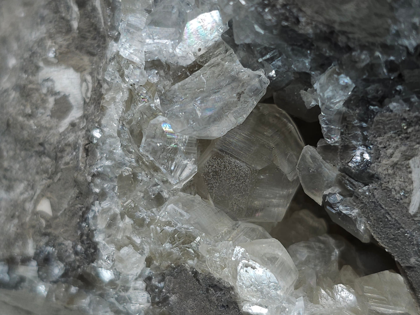 #33150 Super clear Nailhead Spar Calcite geode with Chalcopyrite ore and multiple small fossils in the matrix