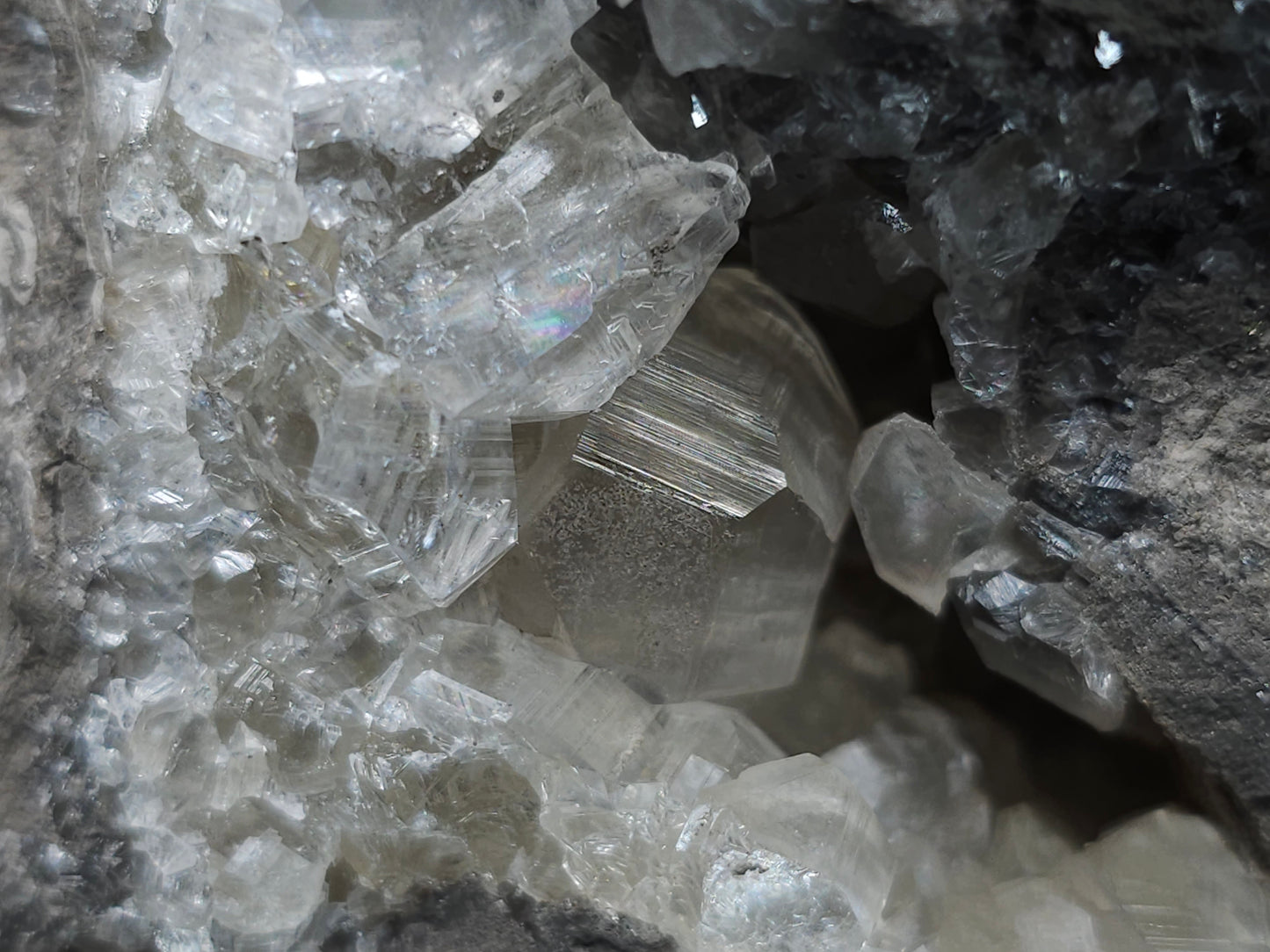 #33150 Super clear Nailhead Spar Calcite geode with Chalcopyrite ore and multiple small fossils in the matrix