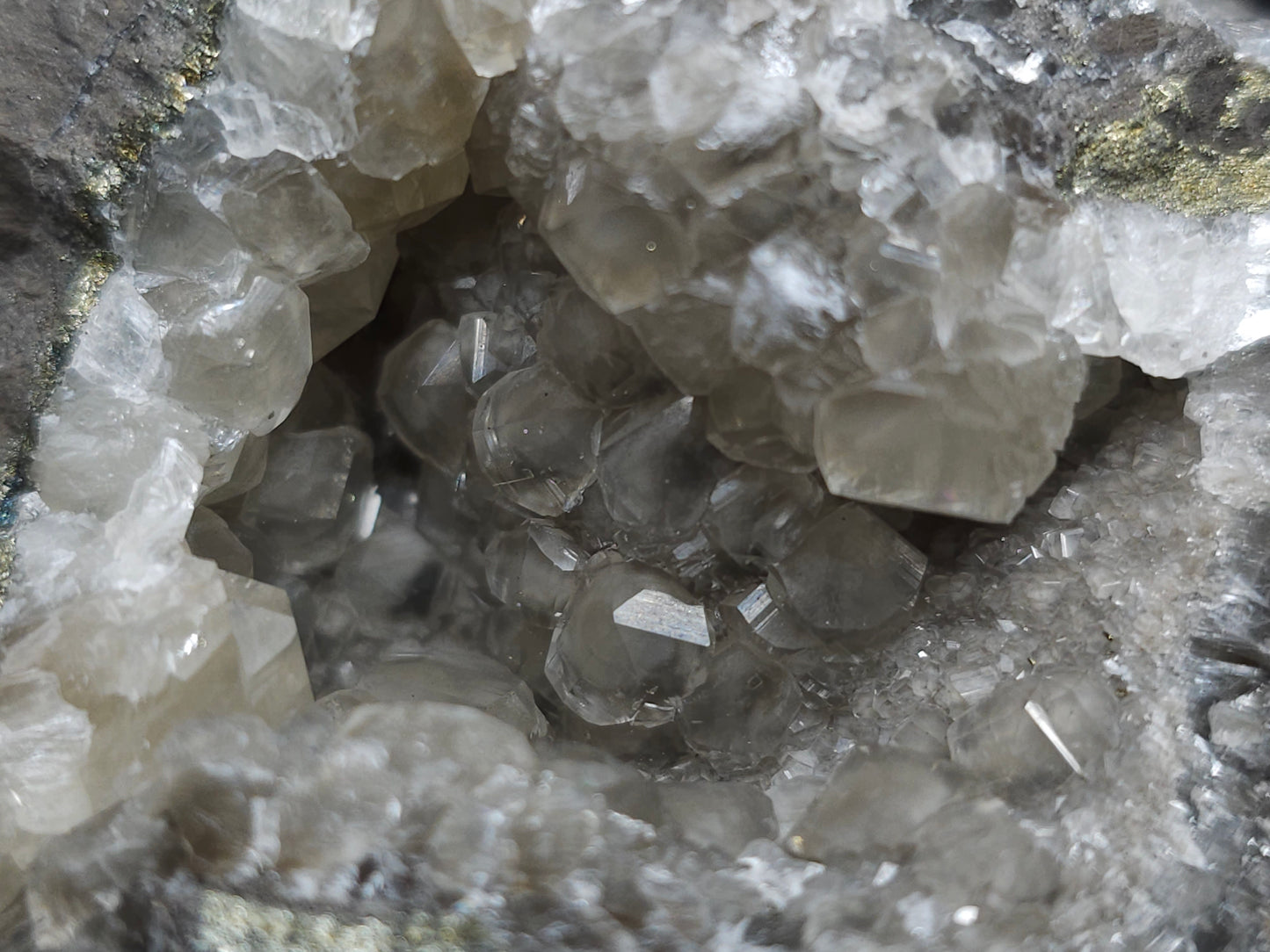 #33145 Super clear Nailhead Spar Calcite geode with Chalcopyrite ore and multiple small fossils in the matrix