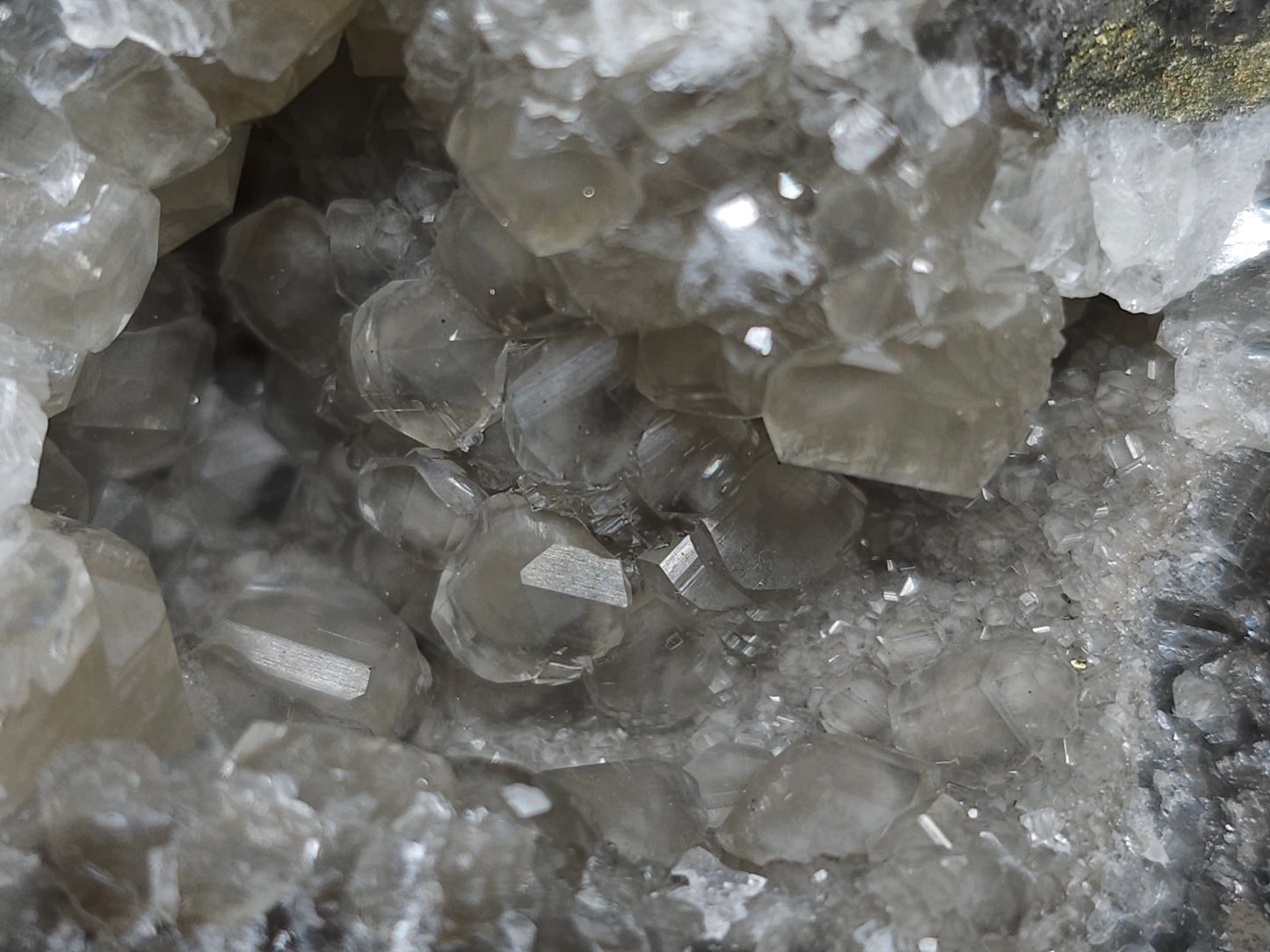 #33145 Super clear Nailhead Spar Calcite geode with Chalcopyrite ore and multiple small fossils in the matrix