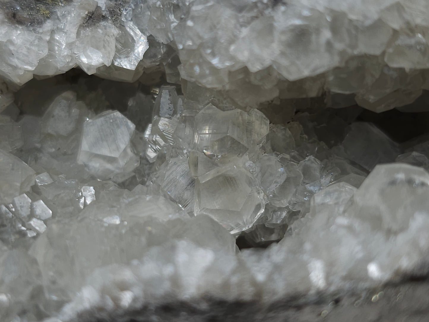 #33137 Super clear Nailhead Spar Calcite geode with Chalcopyrite ore and multiple small fossils in the matrix