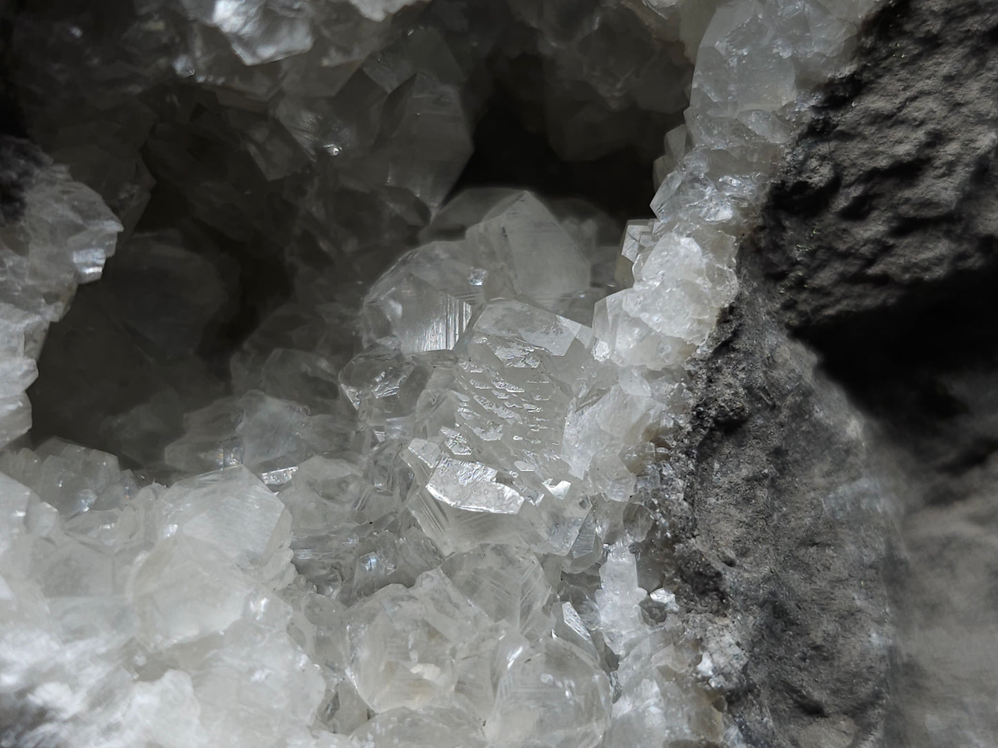 #33137 Super clear Nailhead Spar Calcite geode with Chalcopyrite ore and multiple small fossils in the matrix