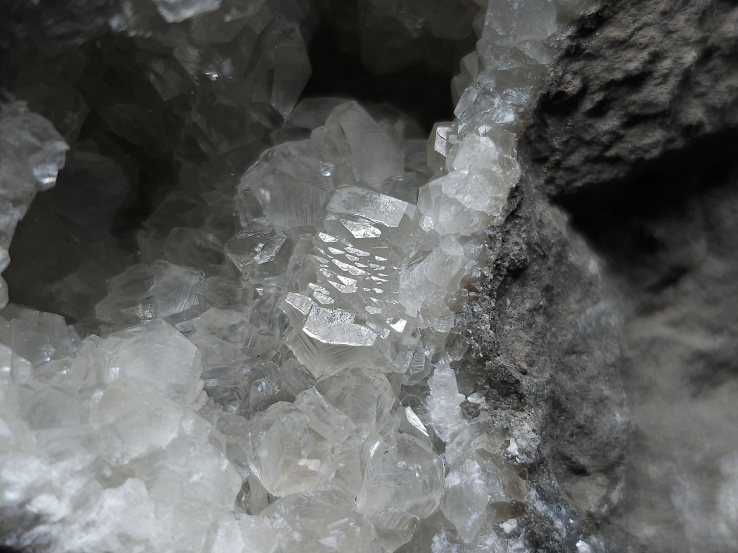 #33137 Super clear Nailhead Spar Calcite geode with Chalcopyrite ore and multiple small fossils in the matrix