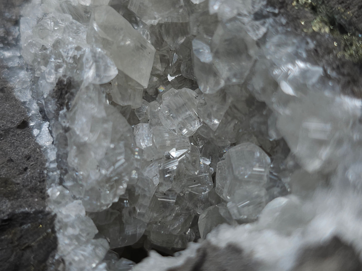 #33136 Super clear Nailhead Spar Calcite geode with Chalcopyrite ore and multiple small fossils in the matrix