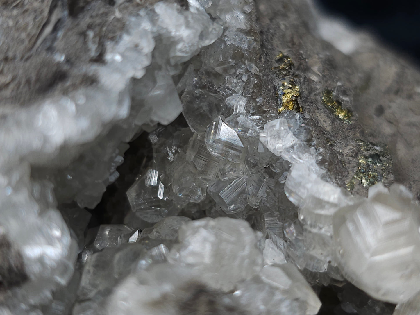 #33151 Super clear Nailhead Spar Calcite geode with Chalcopyrite ore and multiple small fossils in the matrix