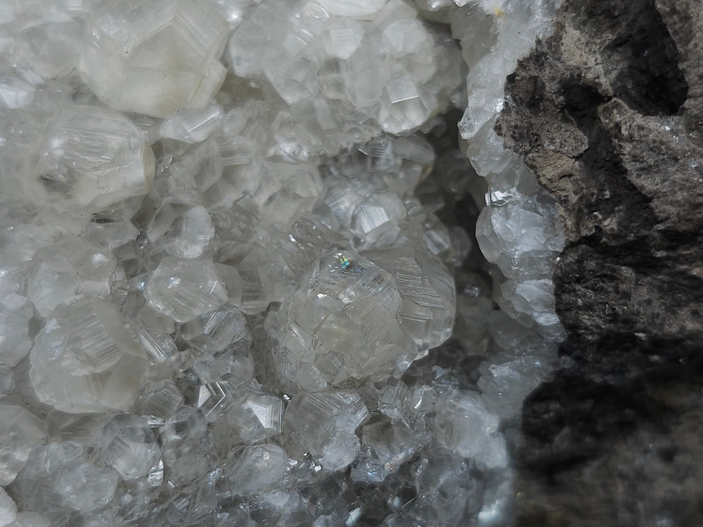 #33151 Super clear Nailhead Spar Calcite geode with Chalcopyrite ore and multiple small fossils in the matrix