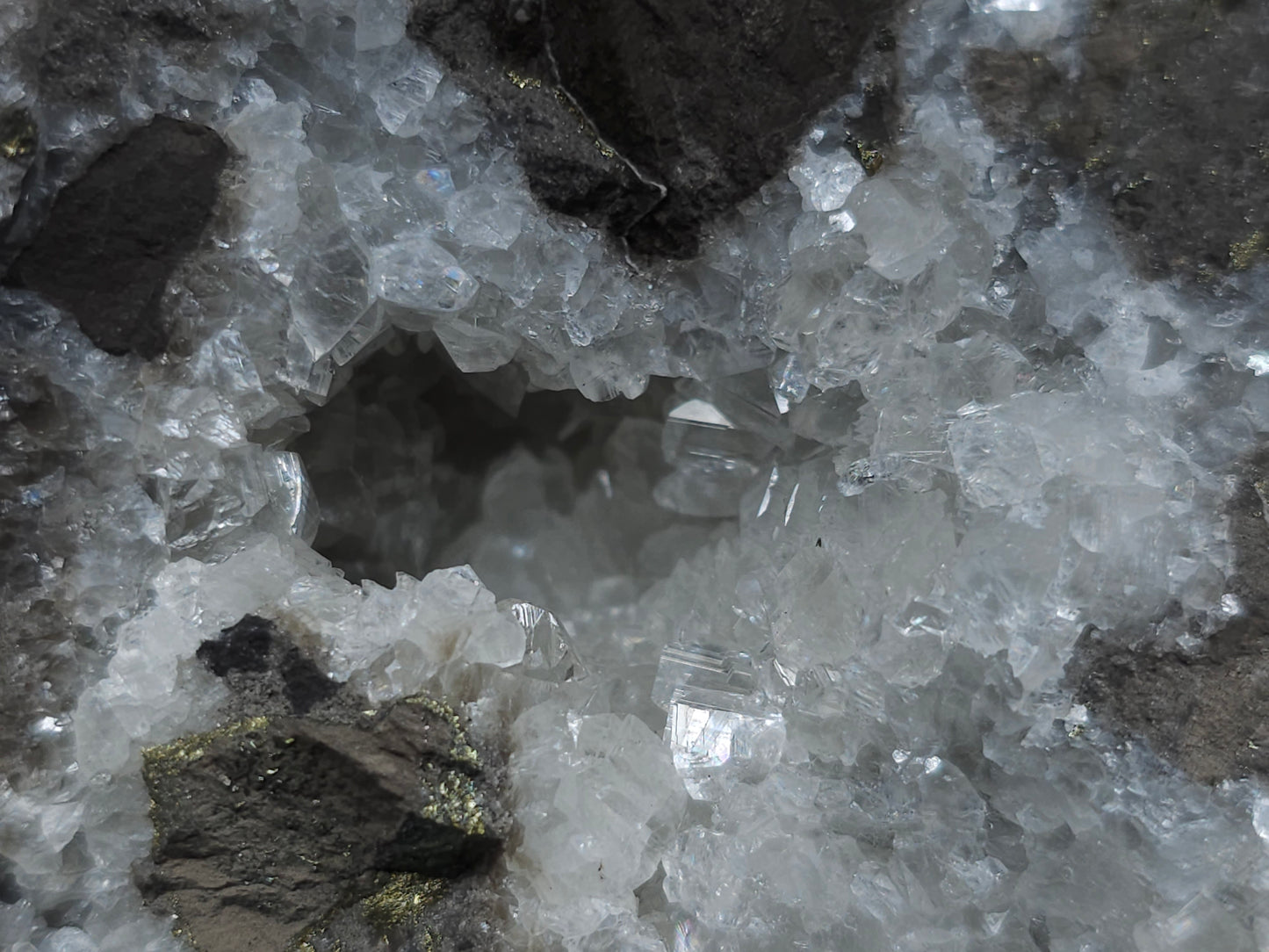 #33160 Super clear Nailhead Spar Calcite geode with Chalcopyrite ore and multiple small fossils in the matrix