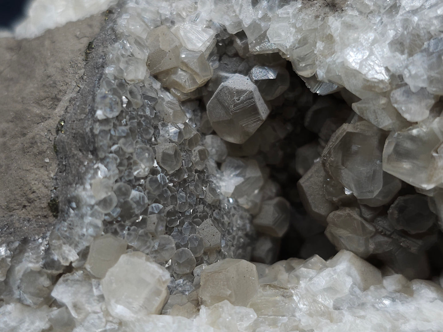 #33177 Double phantom Nailhead and clear Nailhead Spar Calcite geode with Chalcopyrite ore and multiple small fossils in the matrix
