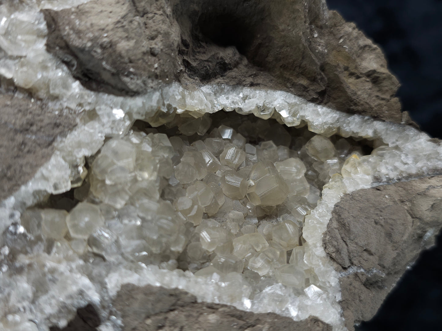 #33973 Super clear Nailhead Spar Calcite geode and Chalcopyrite ore and multiple small fossils in the matrix