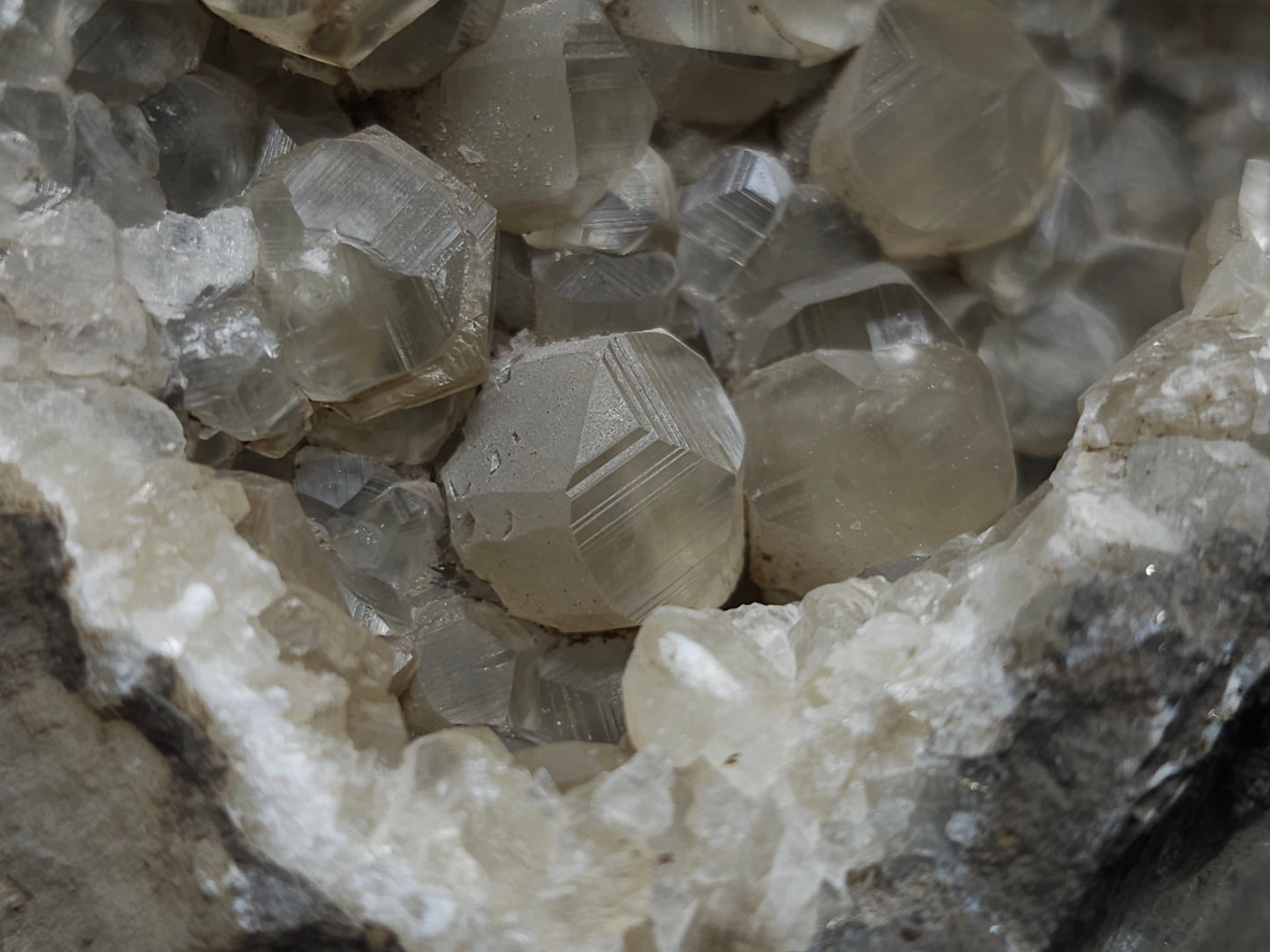 #33977 Super clear Nailhead Spar Calcite geode and Chalcopyrite ore and multiple small fossils in the matrix