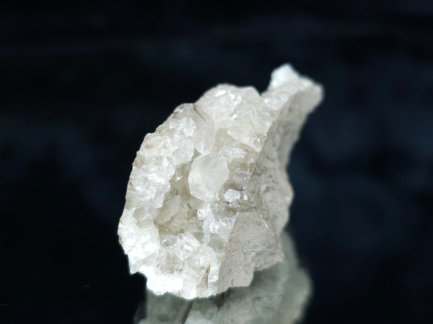 #33998 Super clear Nailhead Spar Calcite cluster and multiple small fossils in the matrix