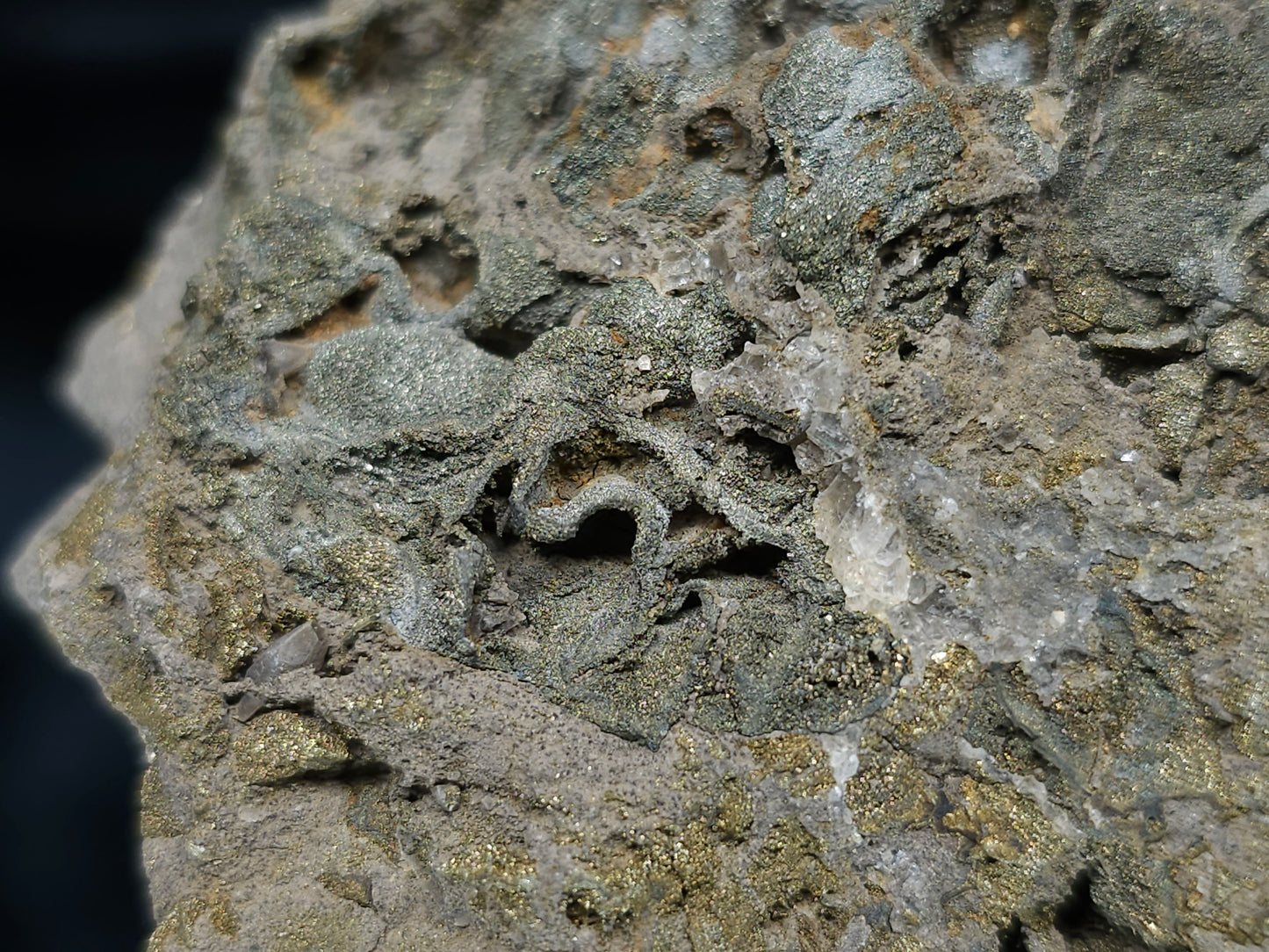 #66036 Chalcopyrite ore with tiny lines of calcite, it also have fossil flower with peacock Chalcopyrite ore coating with multiple fossils