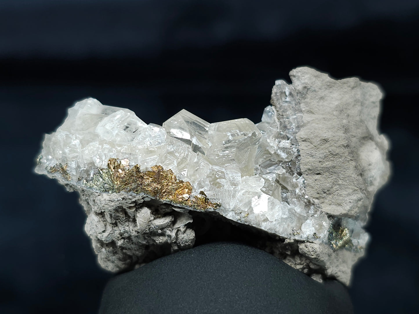 #33652-A Super clear Nailhead Spar Calcite tiny cluster and Chalcopyrite ore and multiple small fossils in the matrix