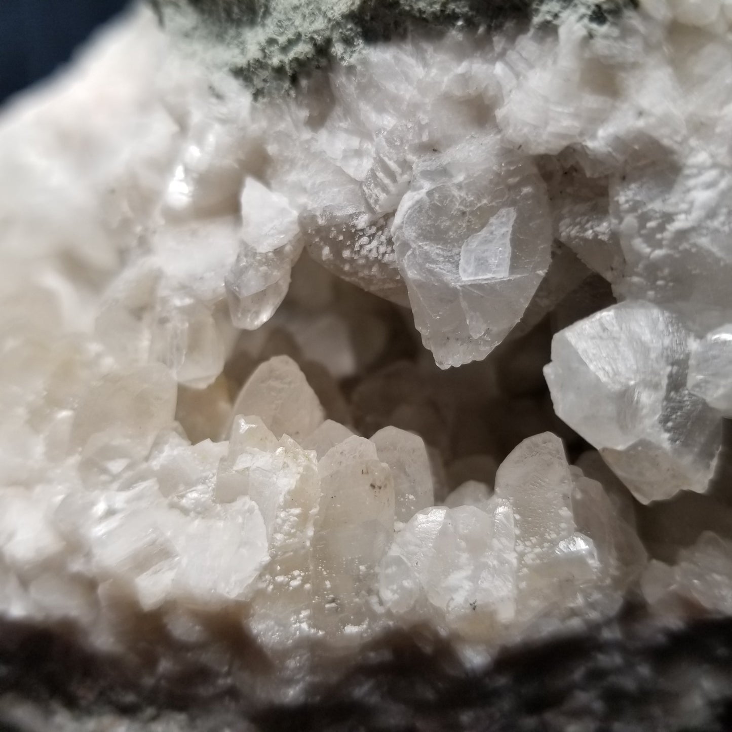 #11028 White Dolomite on clear and white Combined form Calcite mouth with Hematite