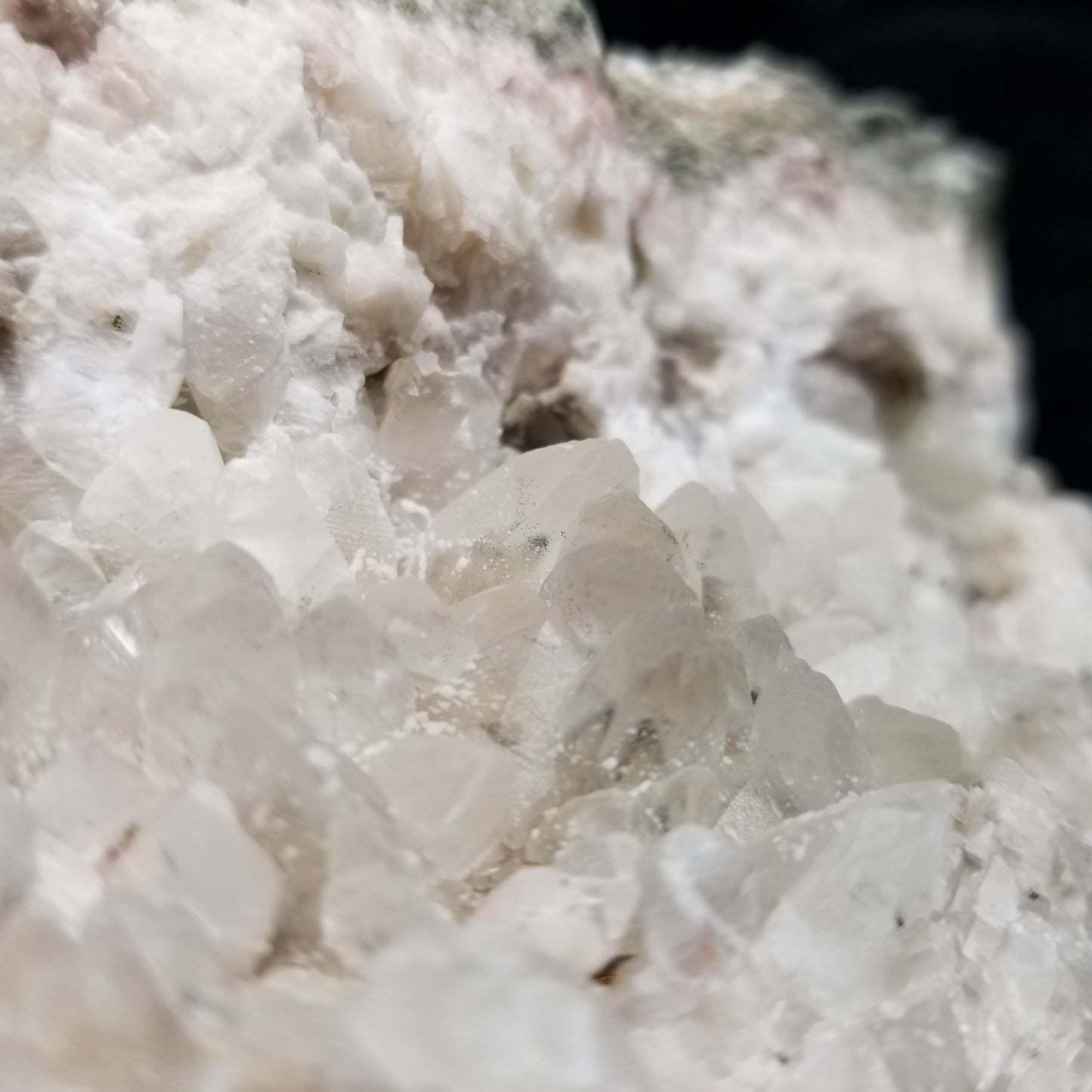 #11048 Dolomite on clear Combined form Calcite cluster with Hematite phantom inclusions