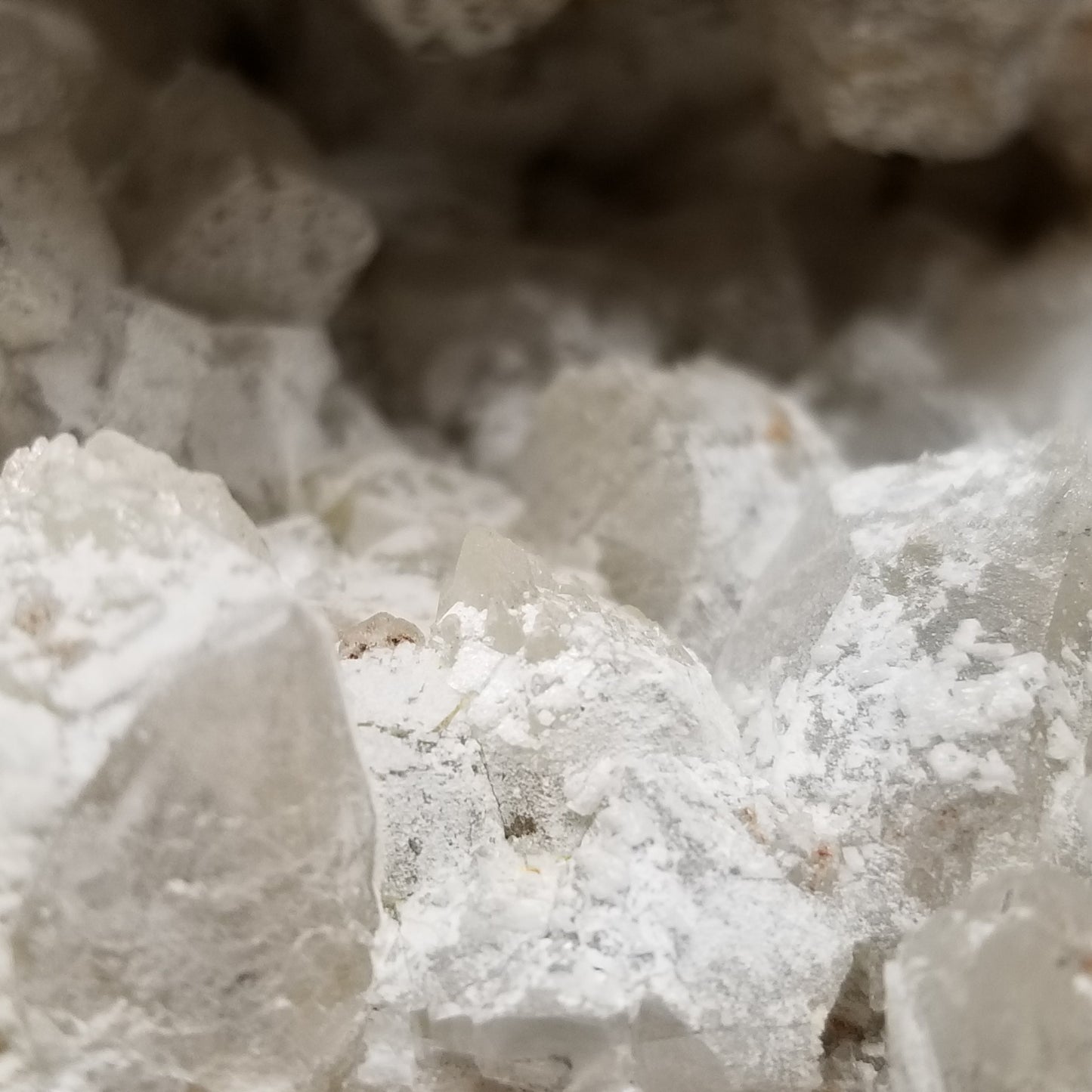 #11048 Dolomite on clear Combined form Calcite cluster with Hematite phantom inclusions