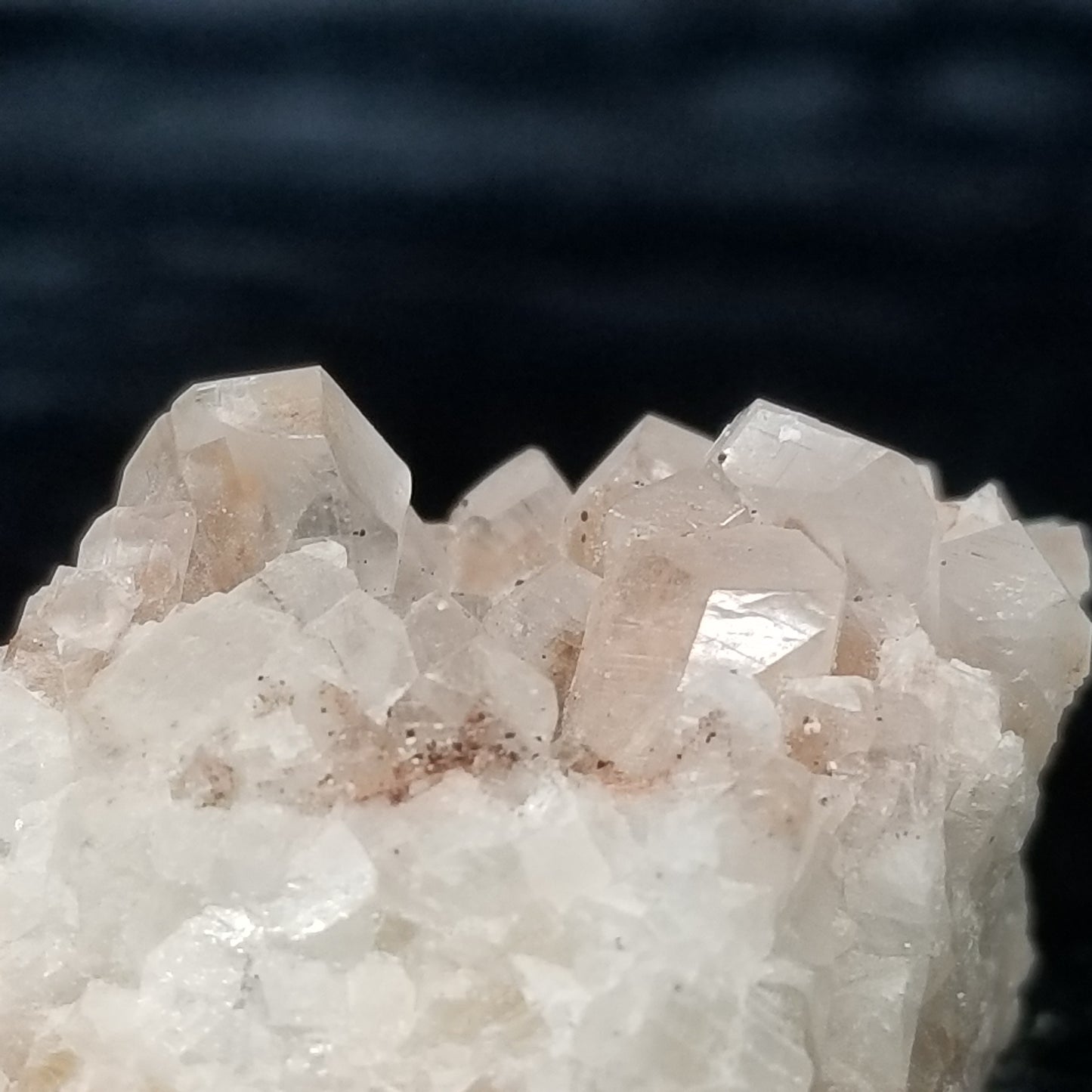 #11049 Hematite on clear Combined form Calcite with Hematite incluisions