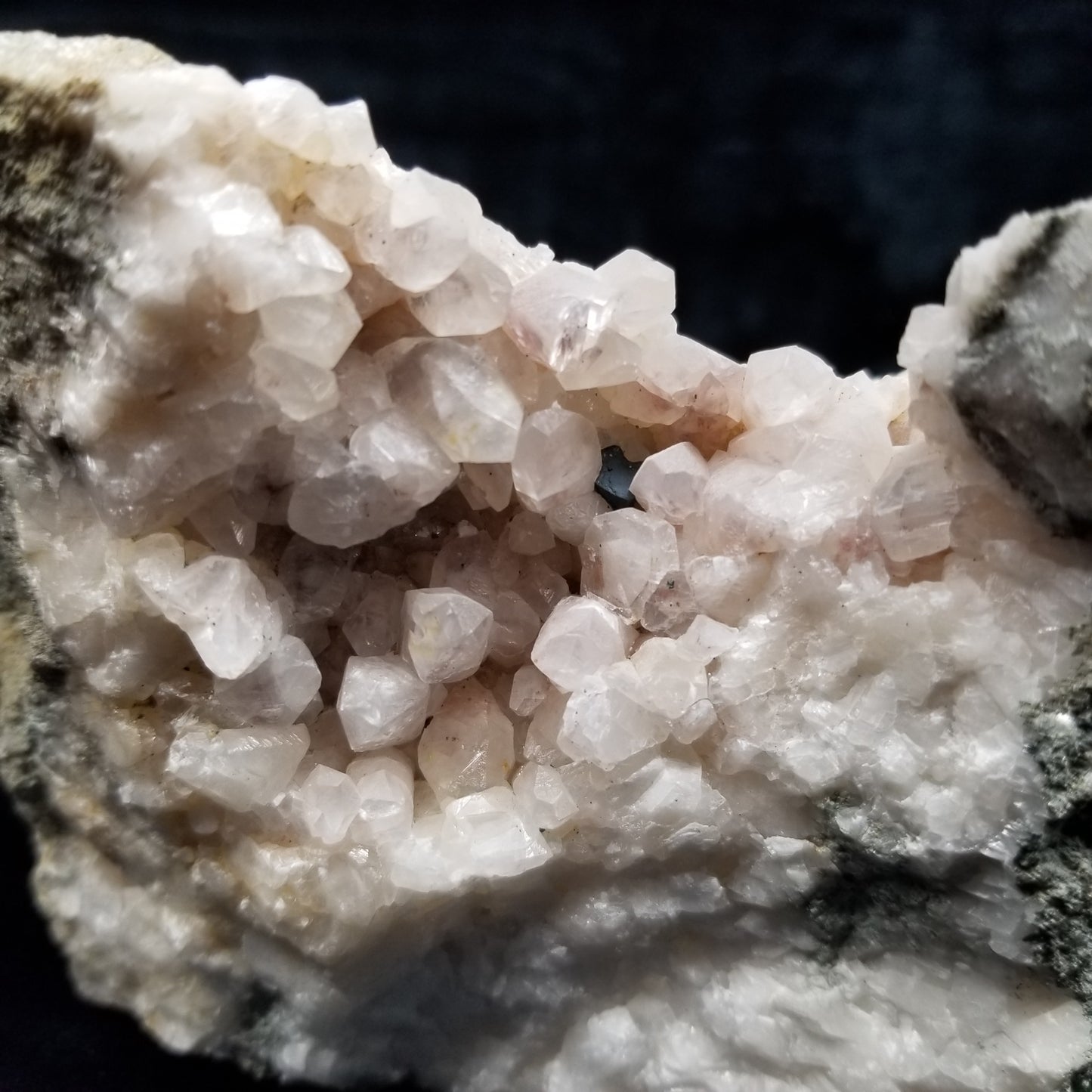 #11057 Chalcopyrite on clear Combined form Calcite with Hematite inclusions