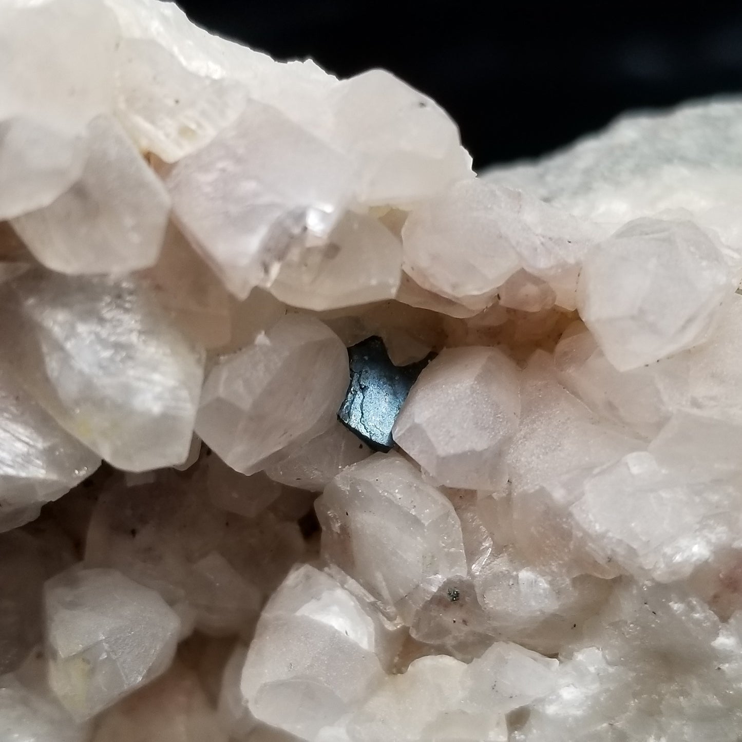 #11057 Chalcopyrite on clear Combined form Calcite with Hematite inclusions