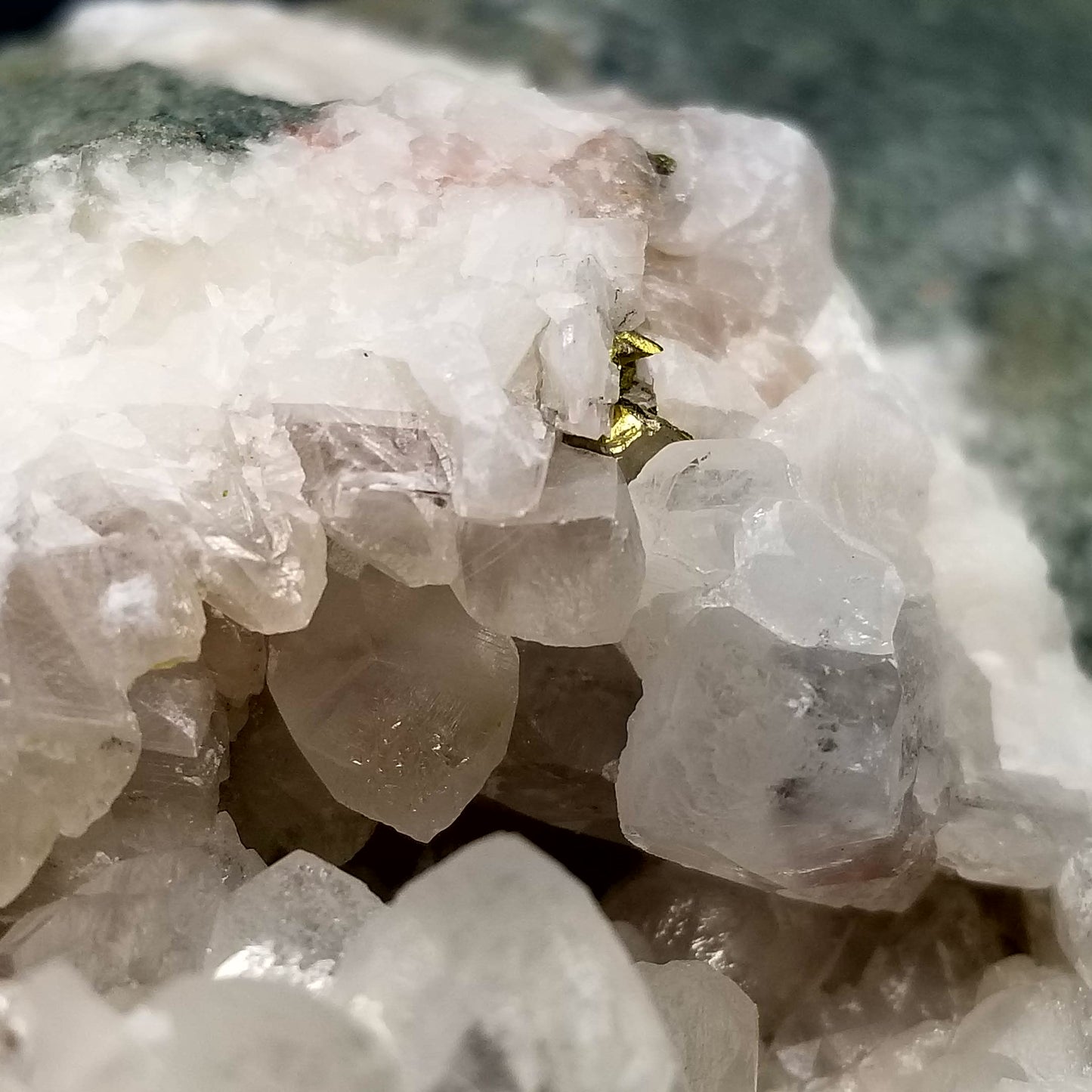 #11088 Chalcopyrite ore on clear Combined form Calcite with phantom Chalcopyrite inclusions