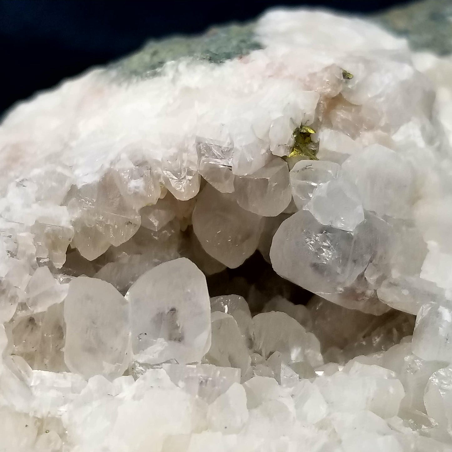 #11088 Chalcopyrite ore on clear Combined form Calcite with phantom Chalcopyrite inclusions