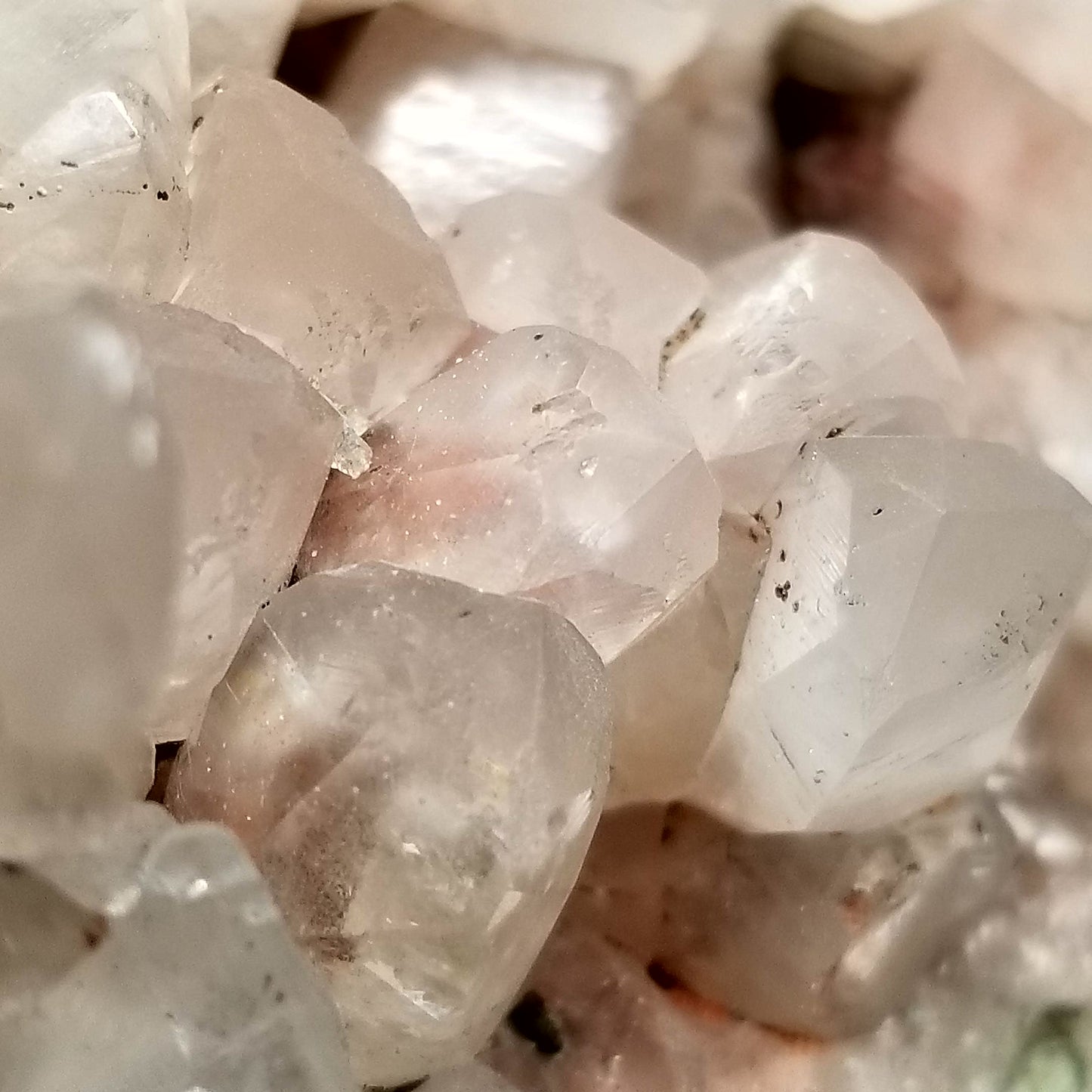 #11161 Hematite on clear Combined form Calcite cluster with Hematite phantom inclusions