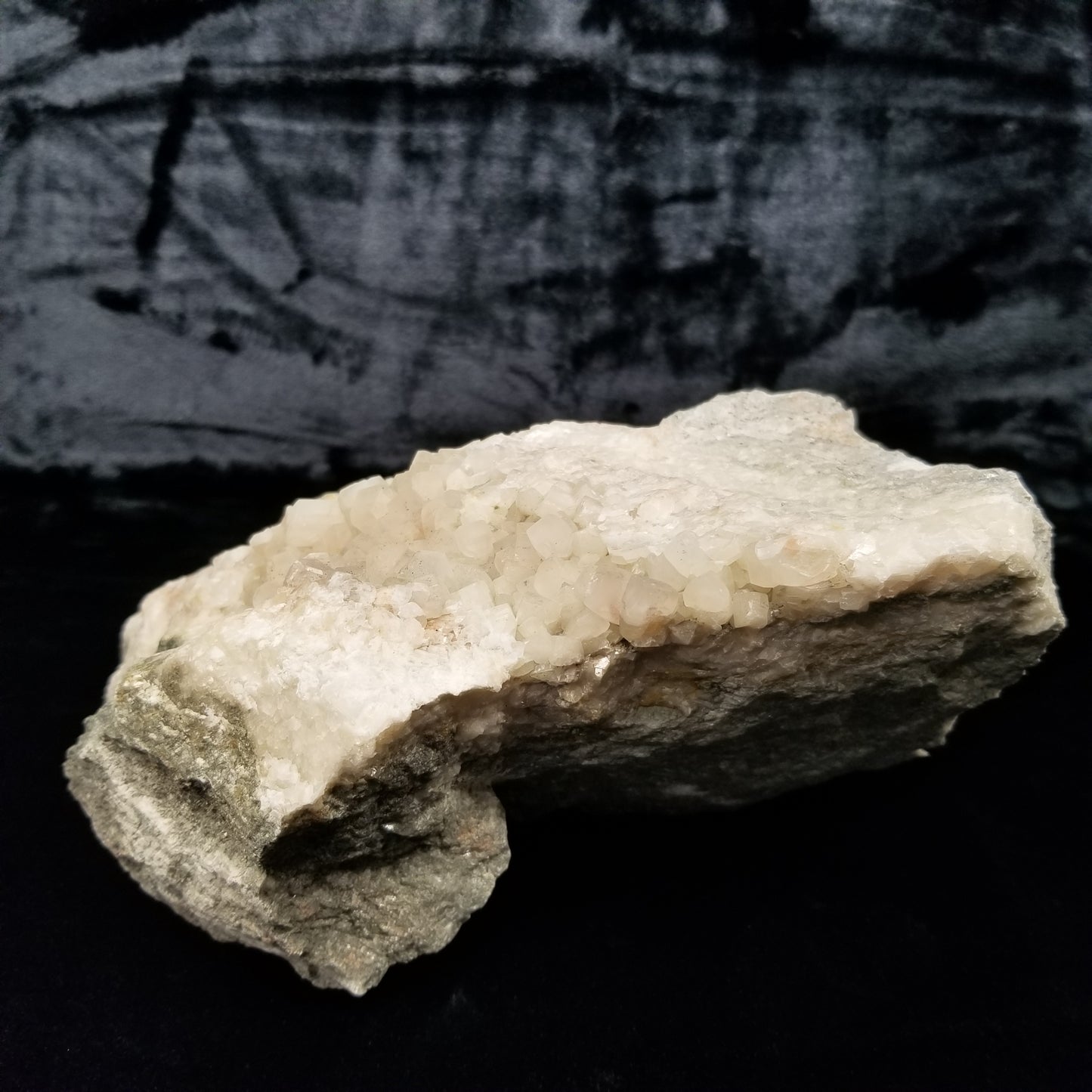 #11231 Chalcopyrite on clear Combined form Calcite with Hematite inclusions on matrix