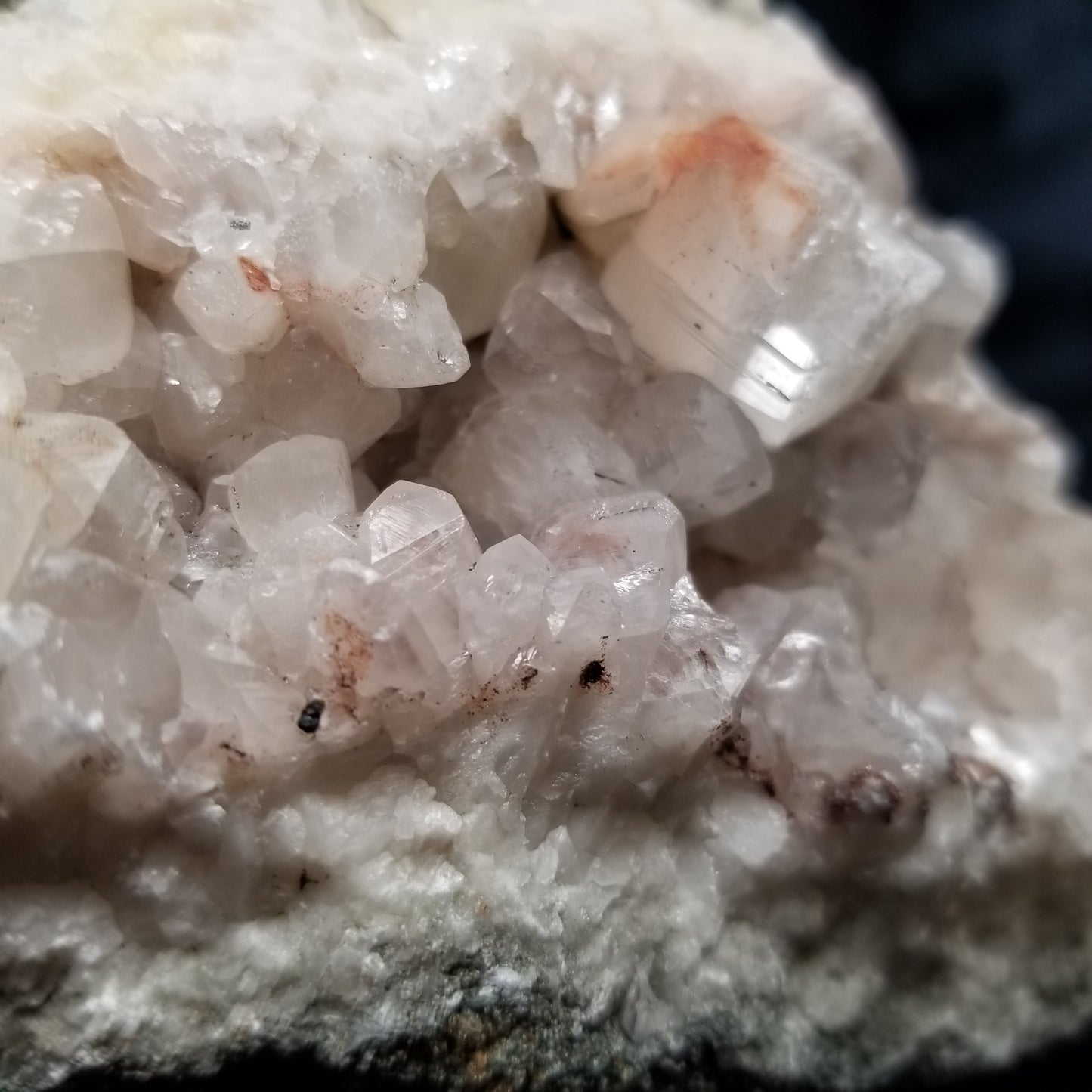 #11258 Chalcopyrite on clear Combined form Calcite cluster with phantom Hematite inclusions