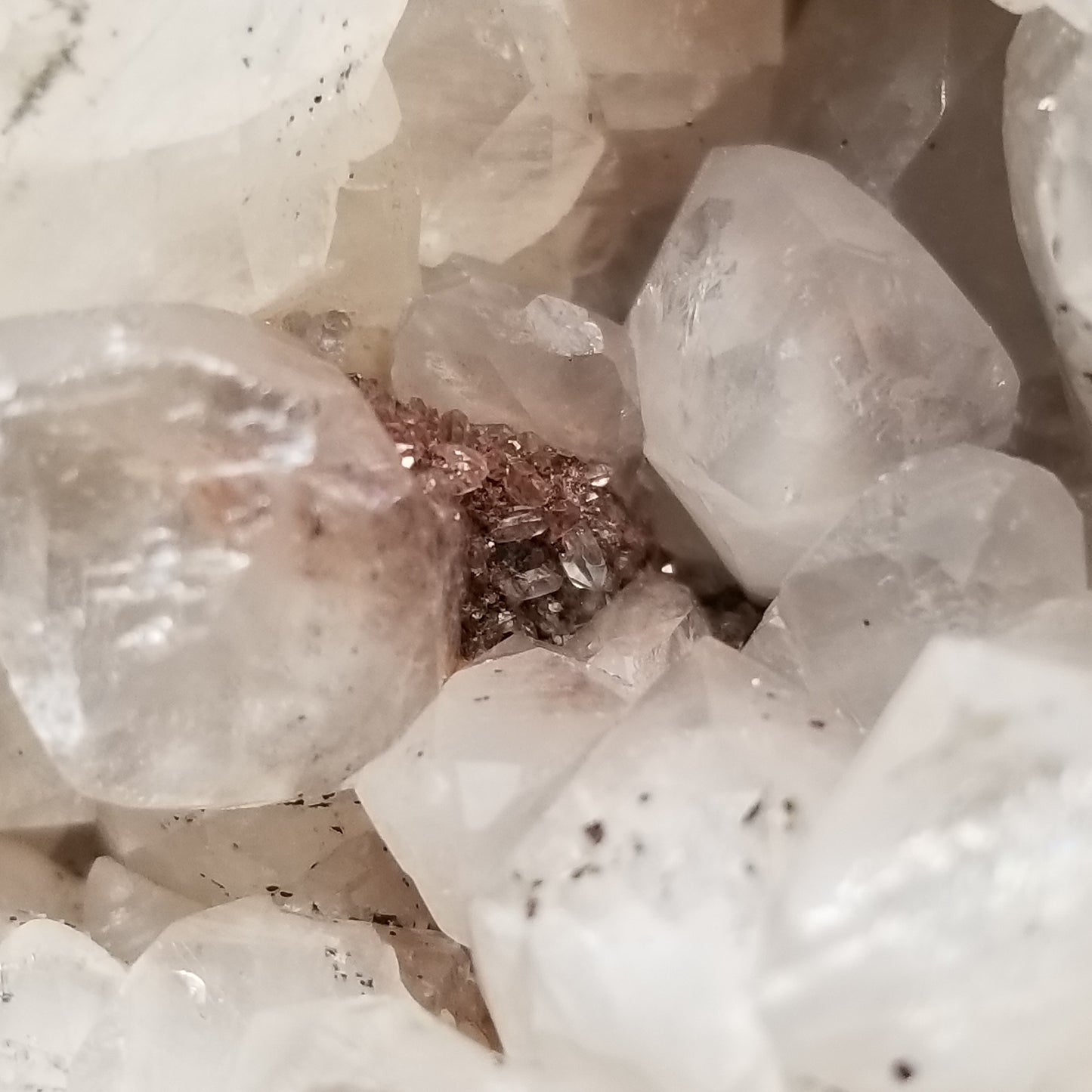 #11258 Chalcopyrite on clear Combined form Calcite cluster with phantom Hematite inclusions