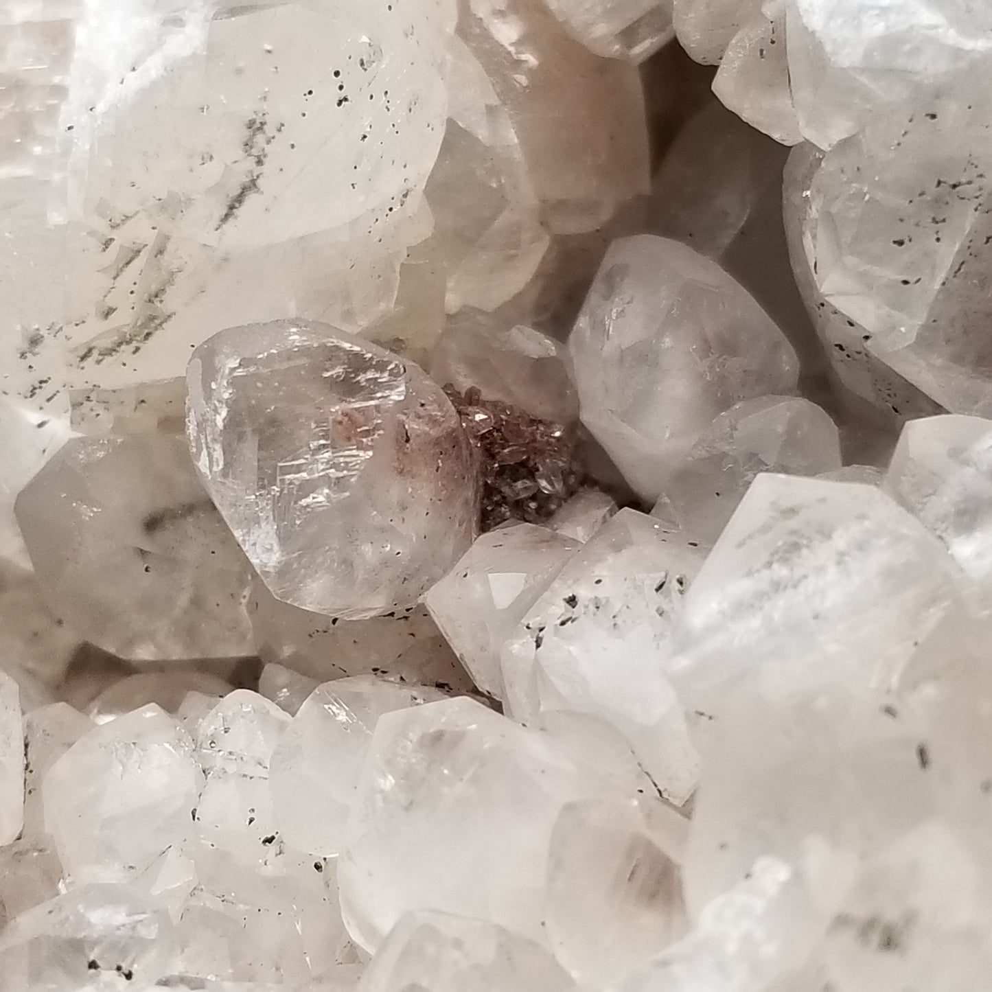 #11258 Chalcopyrite on clear Combined form Calcite cluster with phantom Hematite inclusions