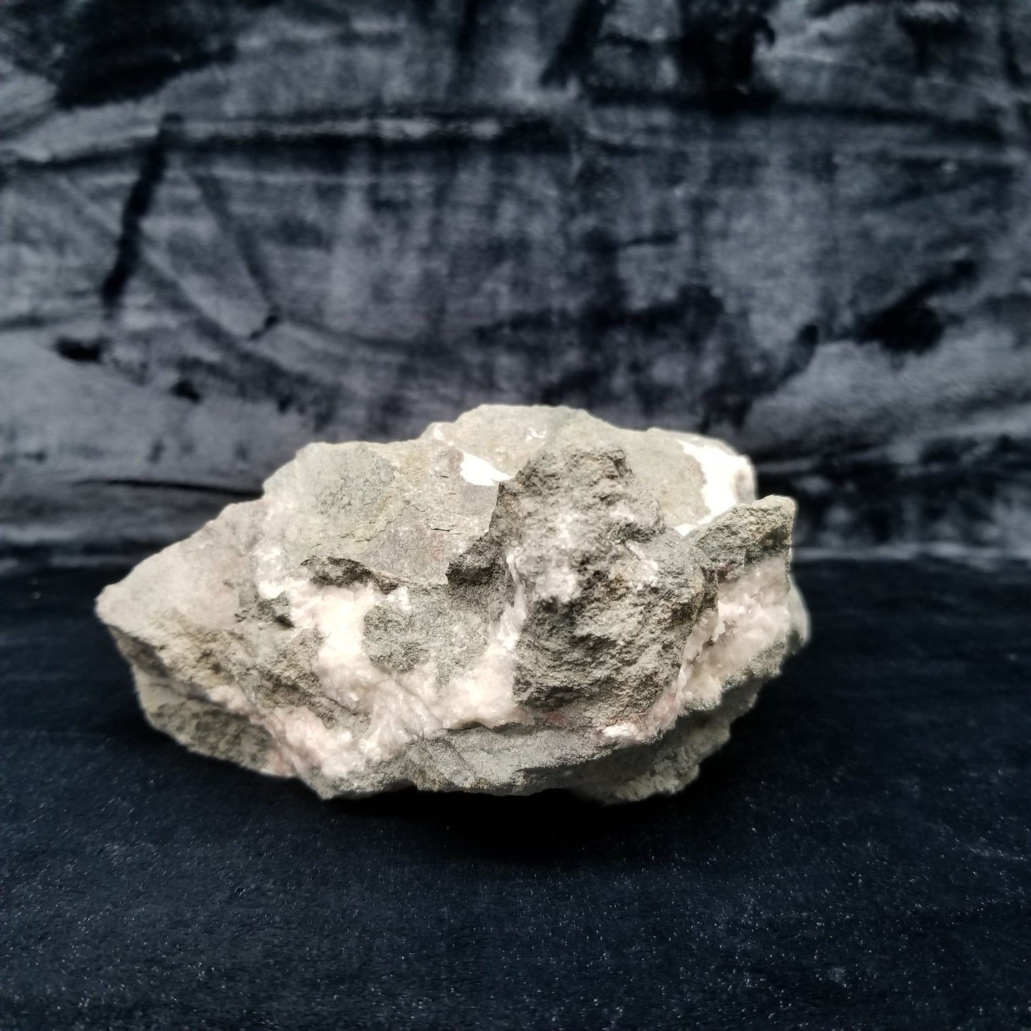#11286 Chalcopyrite on clear Combined form Calcite with Hematite inclusions