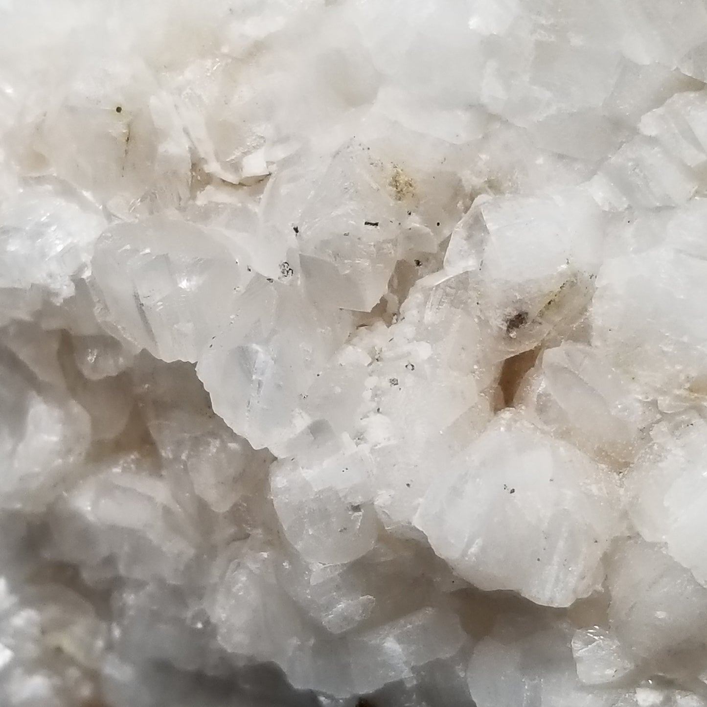 #11287 Chalcopyrite on white Combined form Calcite on matrix