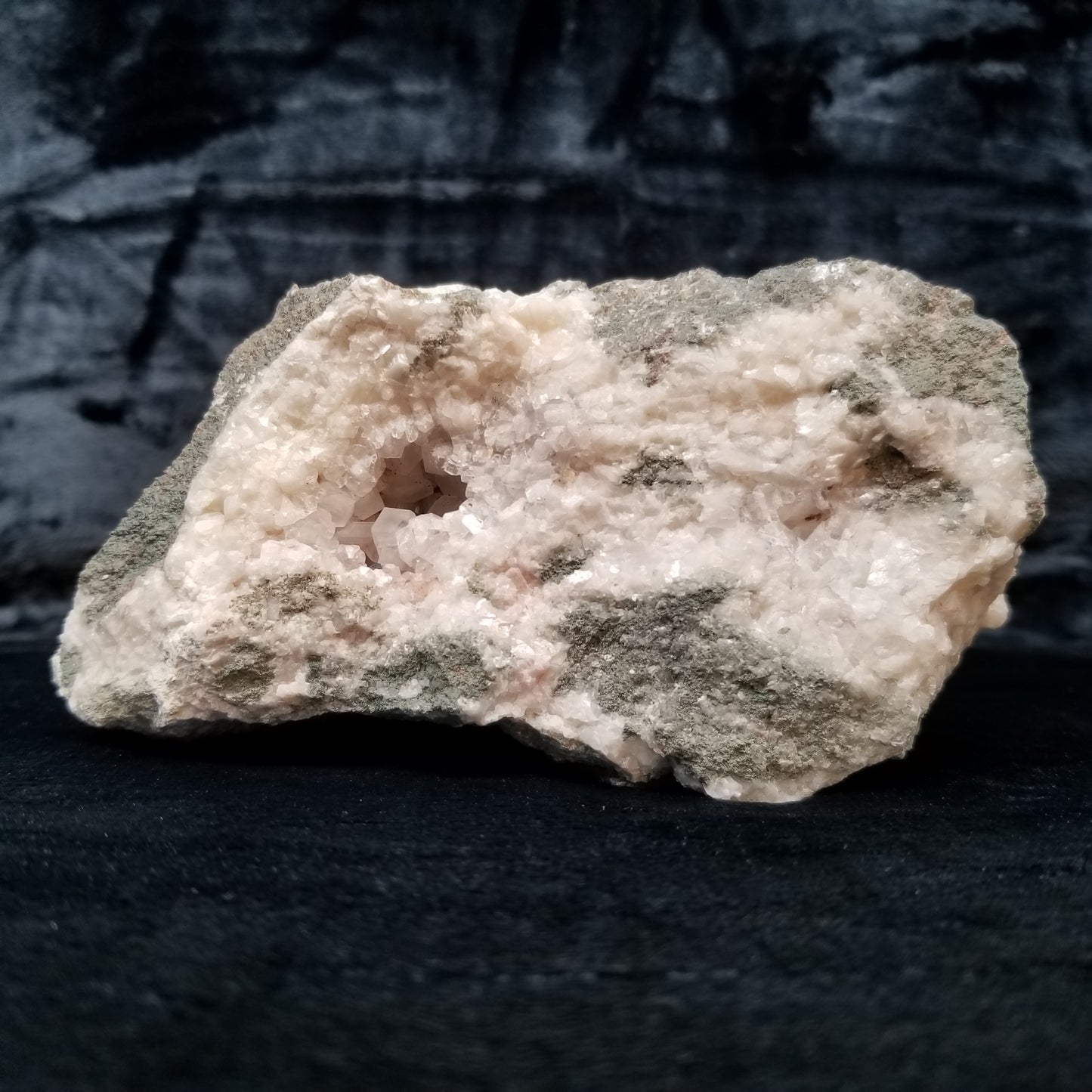 #11299 Chalcopyrite on clear Combined form Calcite with Hematite inclusions